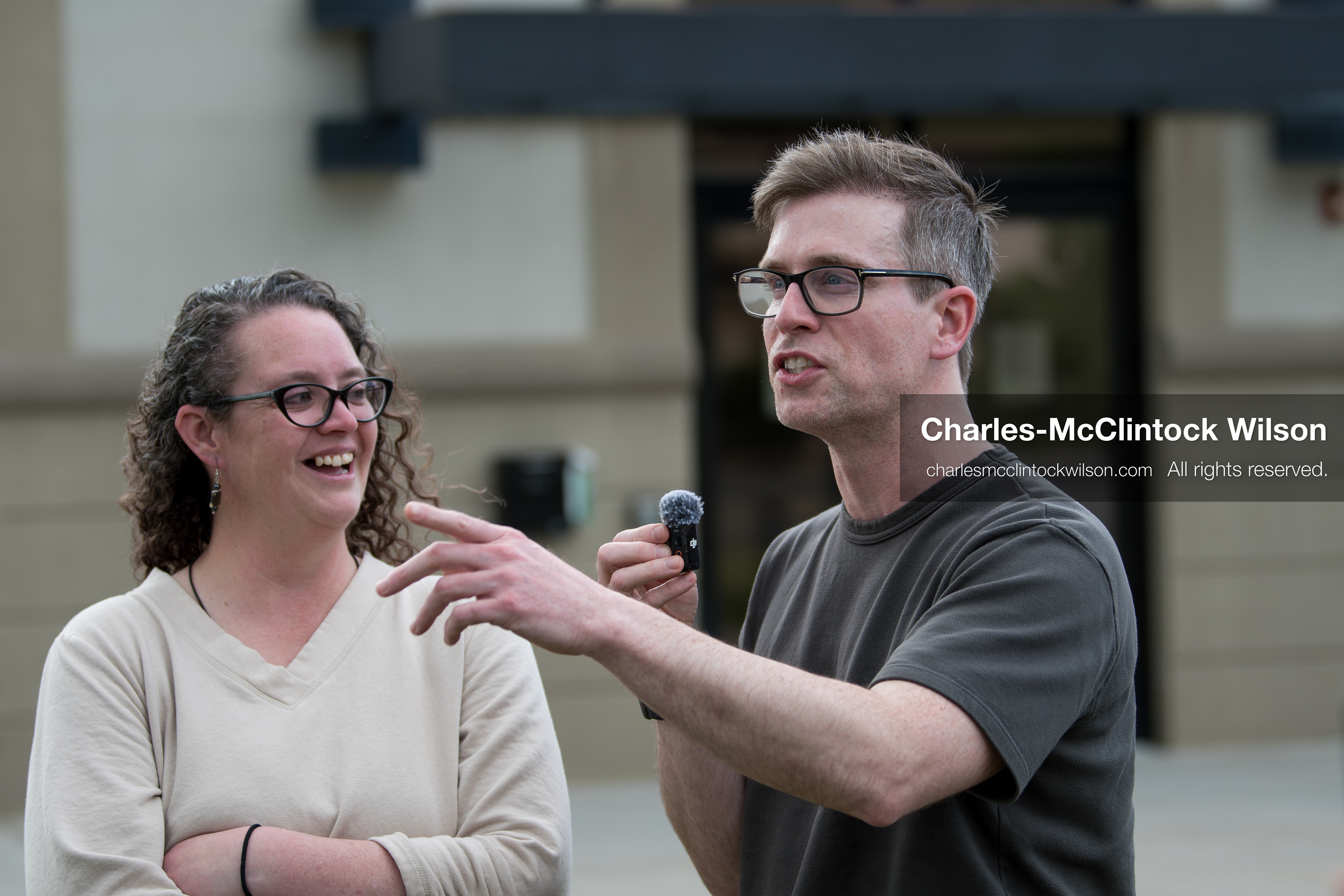 May 13, 2026, Brigham City, Utah, USA: US political satirist and digital creator WALTER MASTERSON interviews a woman outside the Box Elder County Justice Courthouse in Brigham City, Utah, during a gathering over the proposed data‑center project backed by businessman Kevin O’Leary, which has drawn public concern over water use, power demand, and transparency. (Credit Image: © Charles‑McClintock Wilson/ZUMA Press Wire)