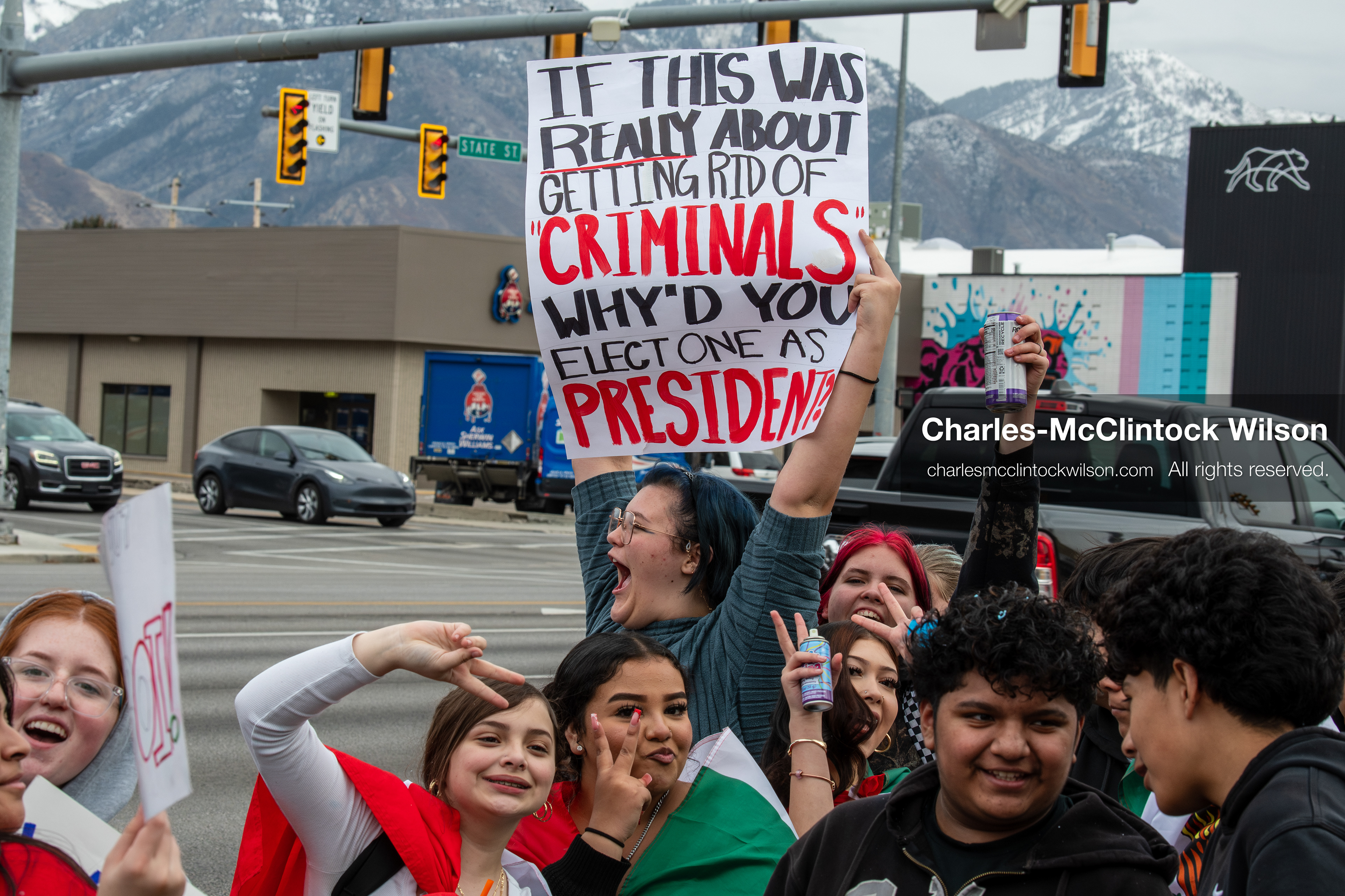 February 11, 2026, Orem, Utah, USA: Students stand on the sidewalk along State Street during a student‑led protest involving participants from multiple Orem schools. (Credit Image: © Charles‑McClintock Wilson/ZUMA Press Wire)