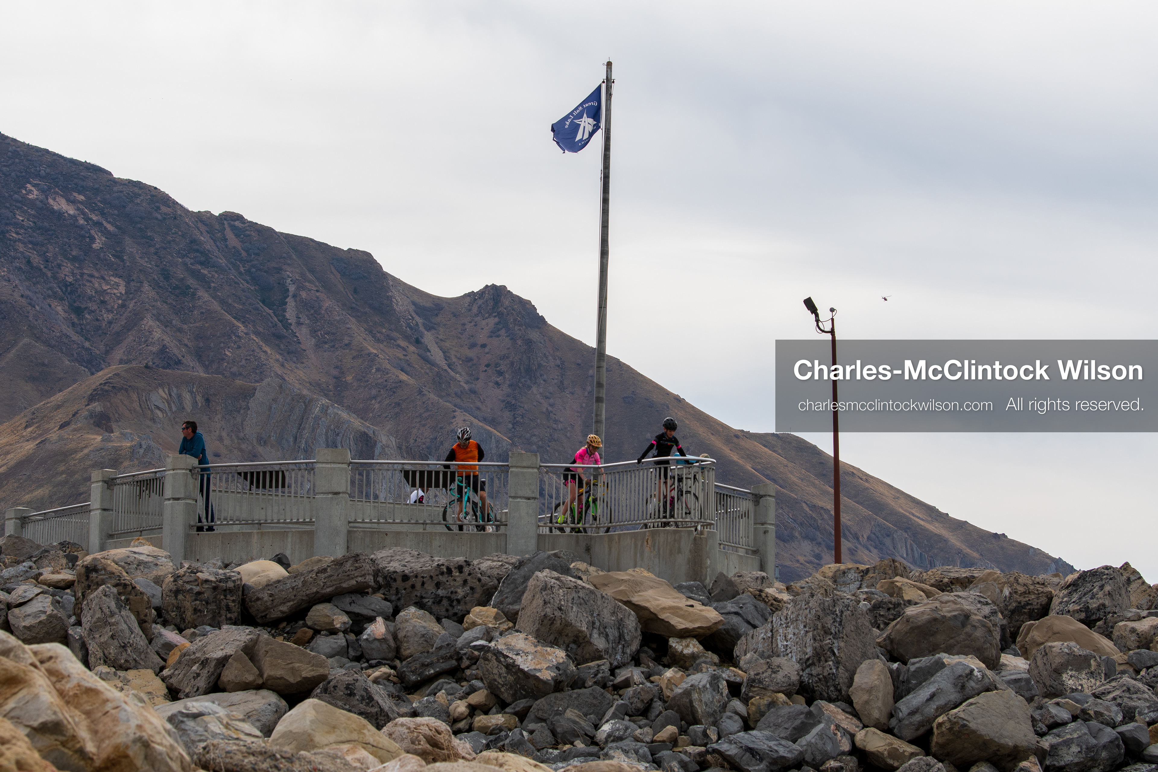 March 1, 2026, Great Salt Lake, Utah, USA: People stand on a platform near the shoreline of the Great Salt Lake as the region continues to experience historically low water levels. Reports from state officials and the Great Salt Lake Strike Team state that the lake remains in a serious adverse‑effects range, with elevations among the lowest recorded in more than one hundred years. The lake has drawn increased public attention as lawmakers consider large‑scale water projects and long‑term plans to address declining conditions. (Credit Image: © Charles‑McClintock Wilson/ZUMA Press Wire)