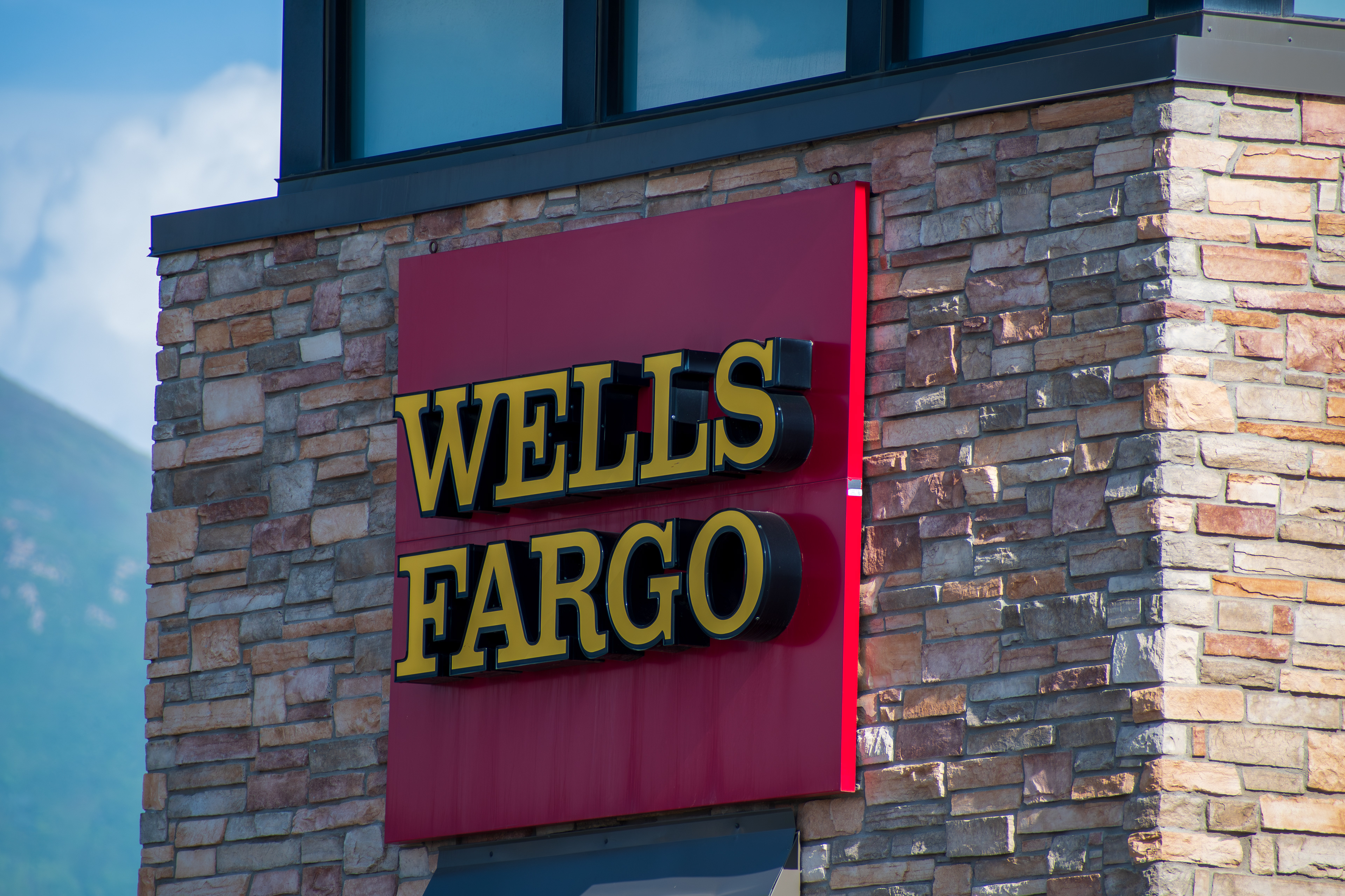 SPANISH FORK, UT - JUNE 8, 2025: The exterior of a Wells Fargo branch in Spanish Fork, Utah. Wells Fargo is an American multinational financial services company with a significant global presence.