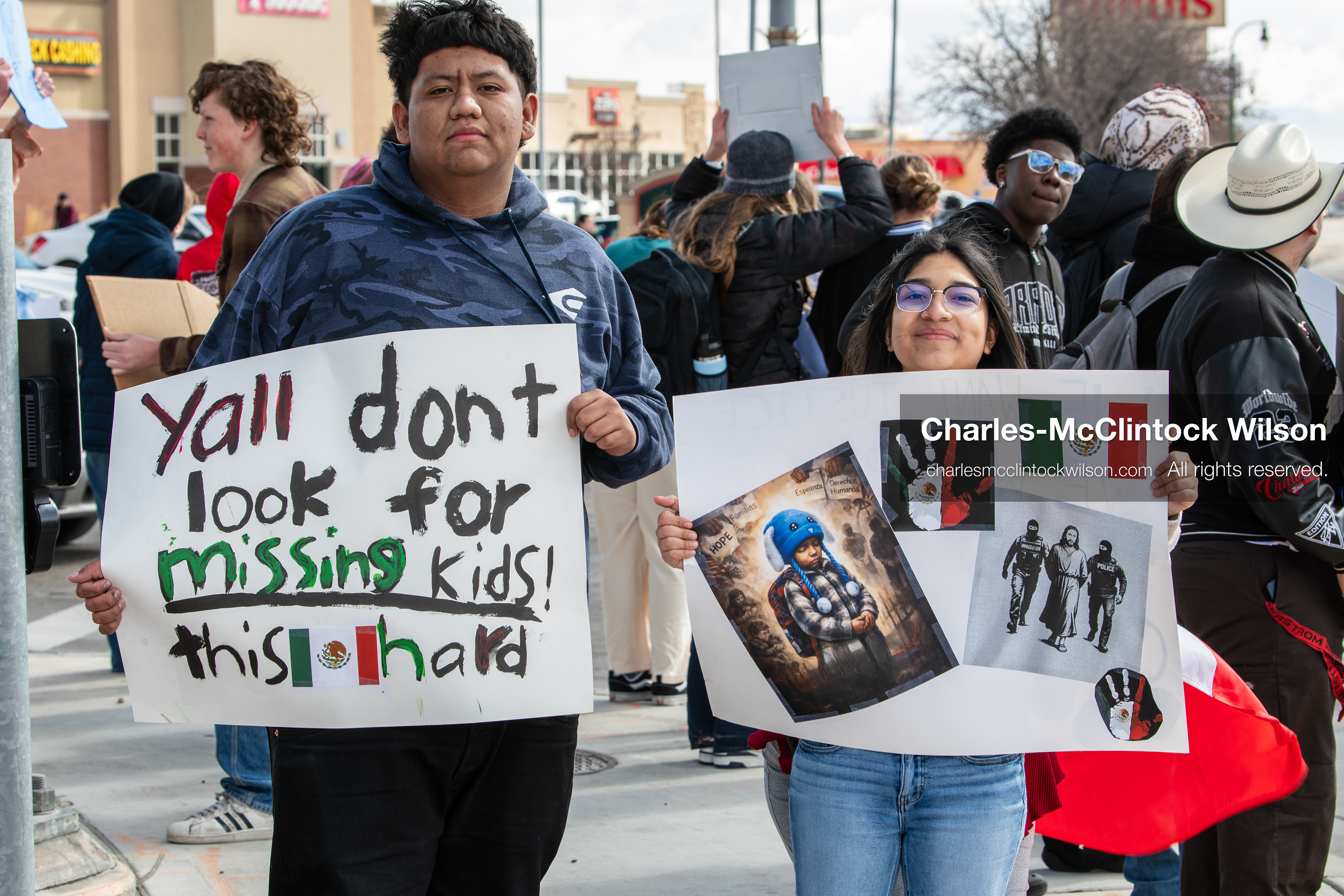 February 20, 2026, Orem, Utah, USA: Participants hold signs during a student led protest against ICE in front of Orem City Hall. Demonstrators stand along State Street as the group gathers in the area. (Credit Image: © Charles McClintock Wilson/ZUMA Press Wire)