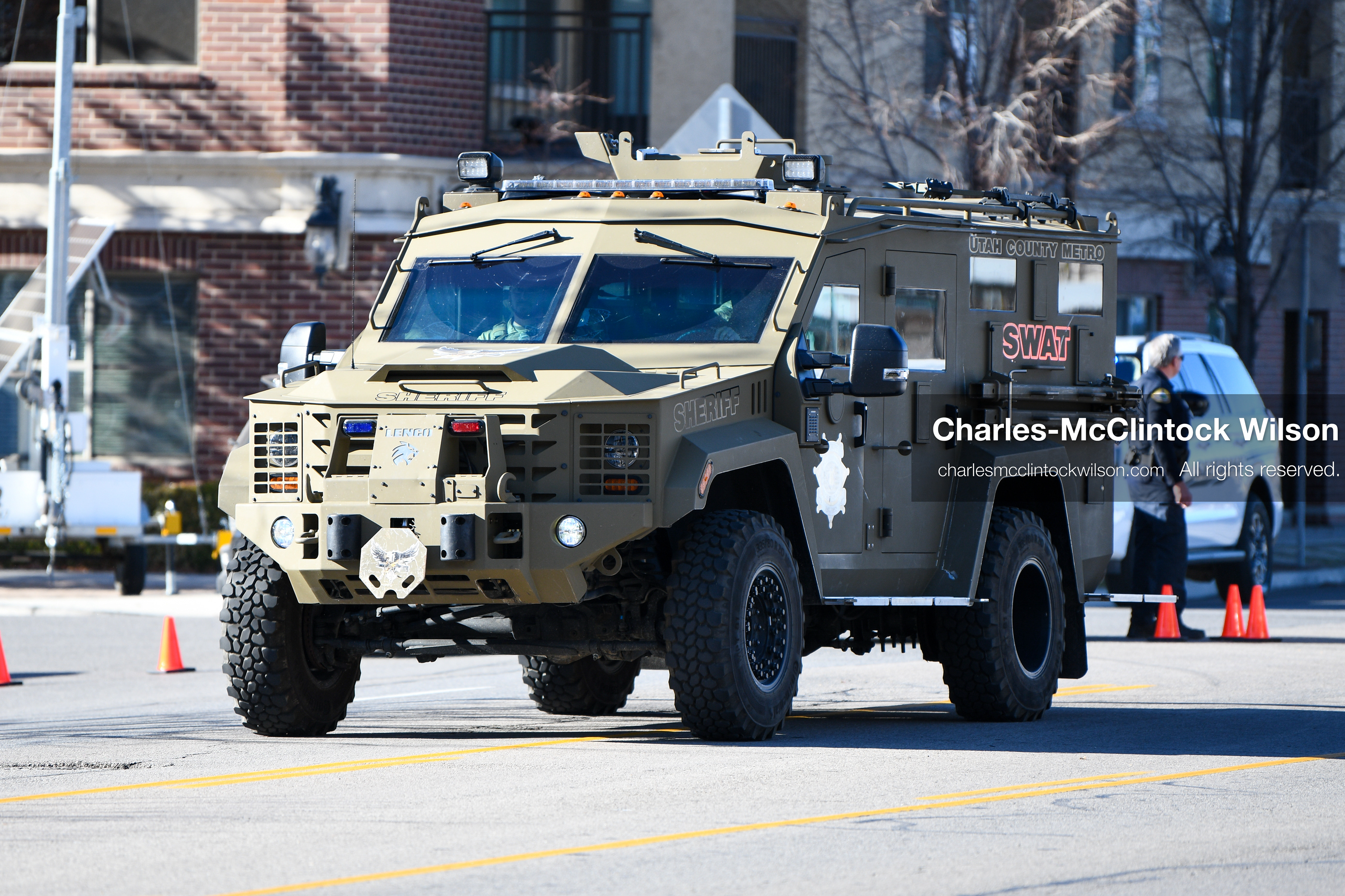 PROVO, UTAH, USA – DECEMBER 11, 2025: An armored vehicle marked SWAT arrives outside the Fourth District Court in Provo, Utah, transporting Tyler Robinson for his first in‑person court appearance in the Charlie Kirk murder case. (Credit Image: © Charles‑McClintock Wilson/ZUMA Press Wire)