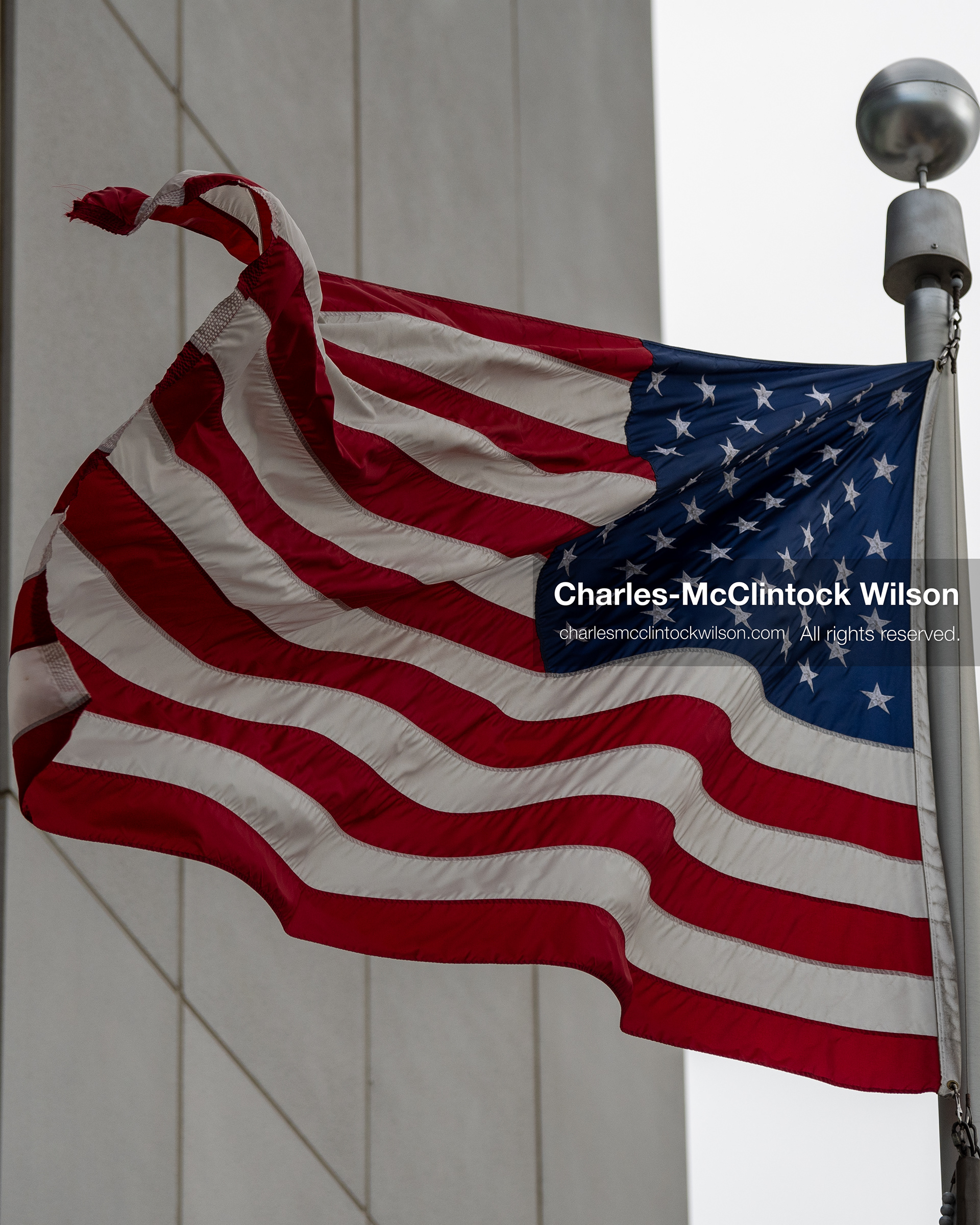 July 9, 2026, Provo, Utah, USA: An American flag waves outside the Fourth District Court in Provo, Utah, during the fourth day of the preliminary hearing in the Tyler Robinson case. (Credit Image: © Charles-McClintock Wilson/ZUMA Press Wire)