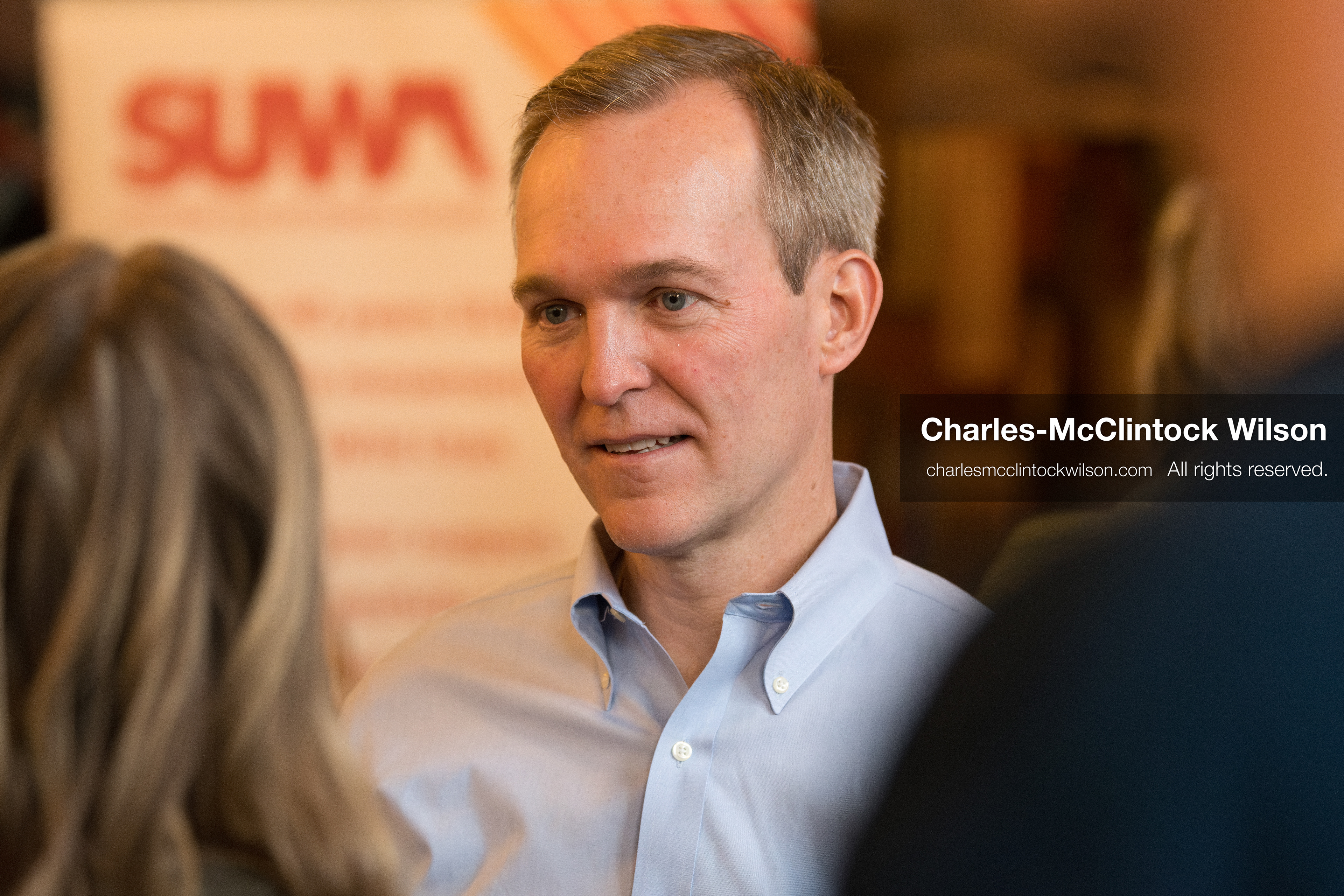 April 22, 2026, Salt Lake City, Utah, USA: Democratic congressional candidate BEN McADAMS speaks with attendees before the Earth Day 1st District Candidate Debate at Church and State Marketplace. The event, hosted by Stewardship Utah, brought together candidates to discuss environmental and policy issues ahead of the 2026 election. (Credit Image: © Charles-McClintock Wilson/ZUMA Press Wire)