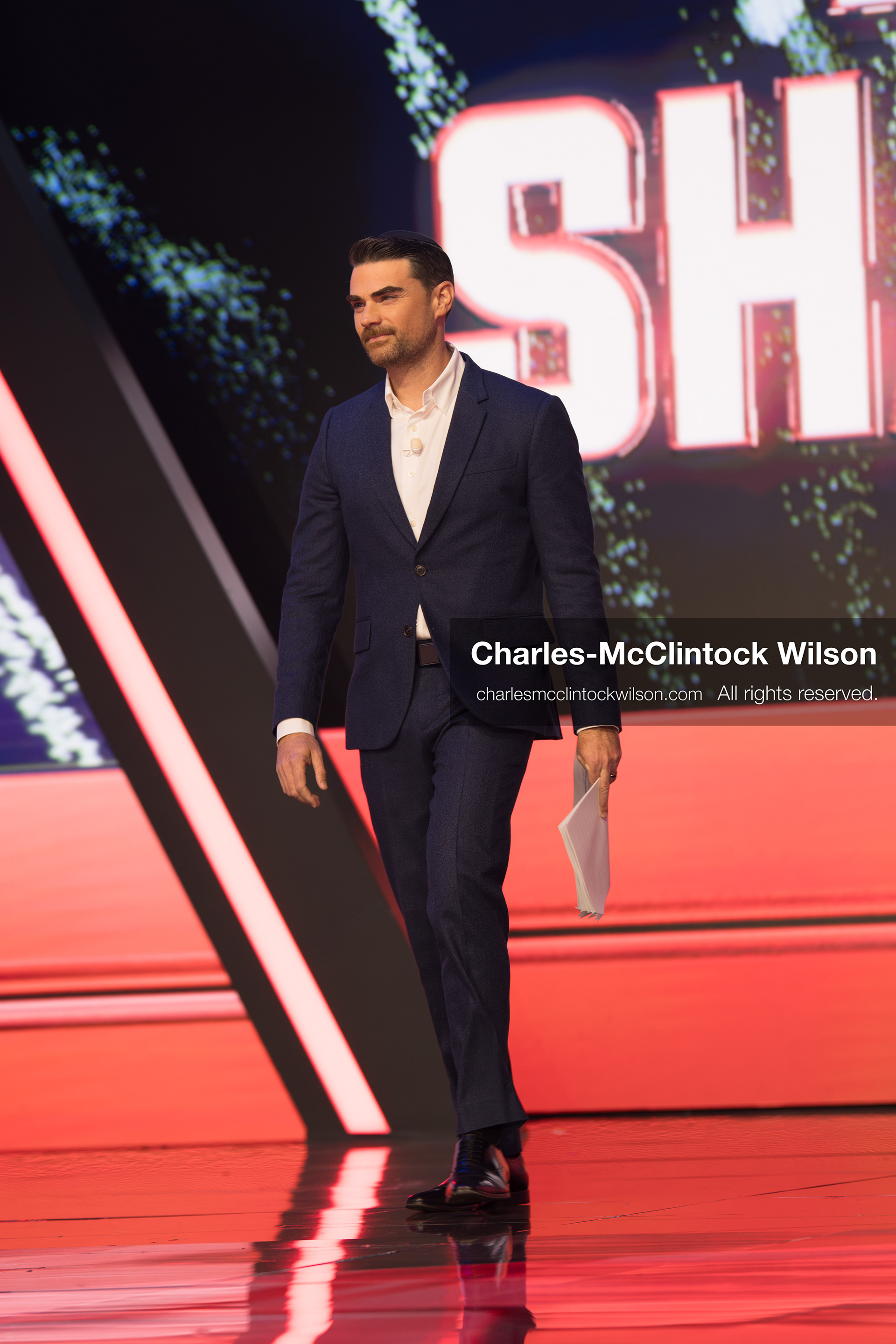 December 18, 2025, Phoenix, Arizona, USA: Ben Shapiro walks toward the stage during Day One of Turning Point USA’s AmericaFest 2025 at the Phoenix Convention Center in Phoenix, Arizona.