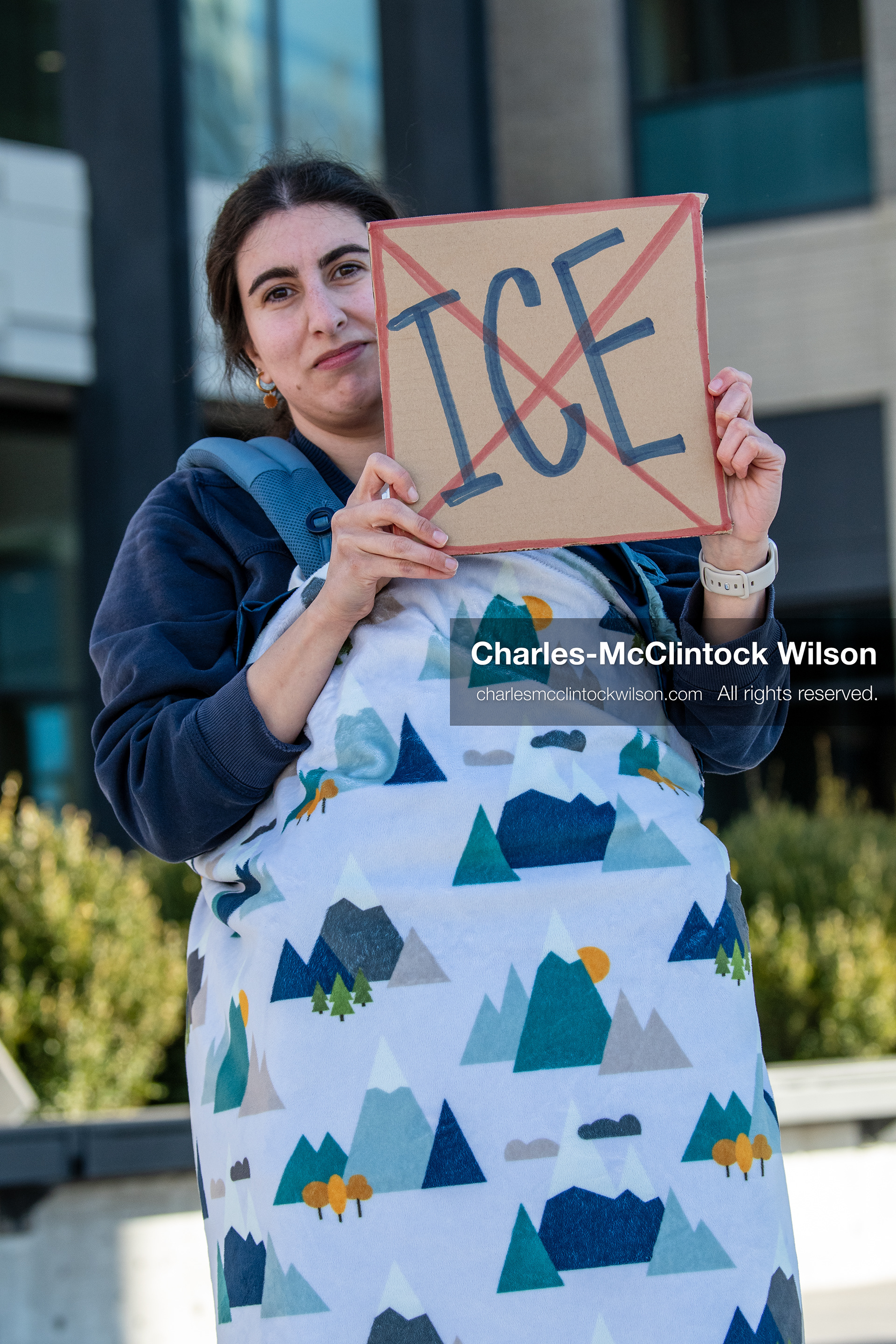  January 20, 2026, Provo, Utah, USA: A demonstrator stands outside Provo City Hall during the Free America Walkout protest in Provo Utah on January 20 2026. The nationwide event called for immigration reform and changes to detention practices.