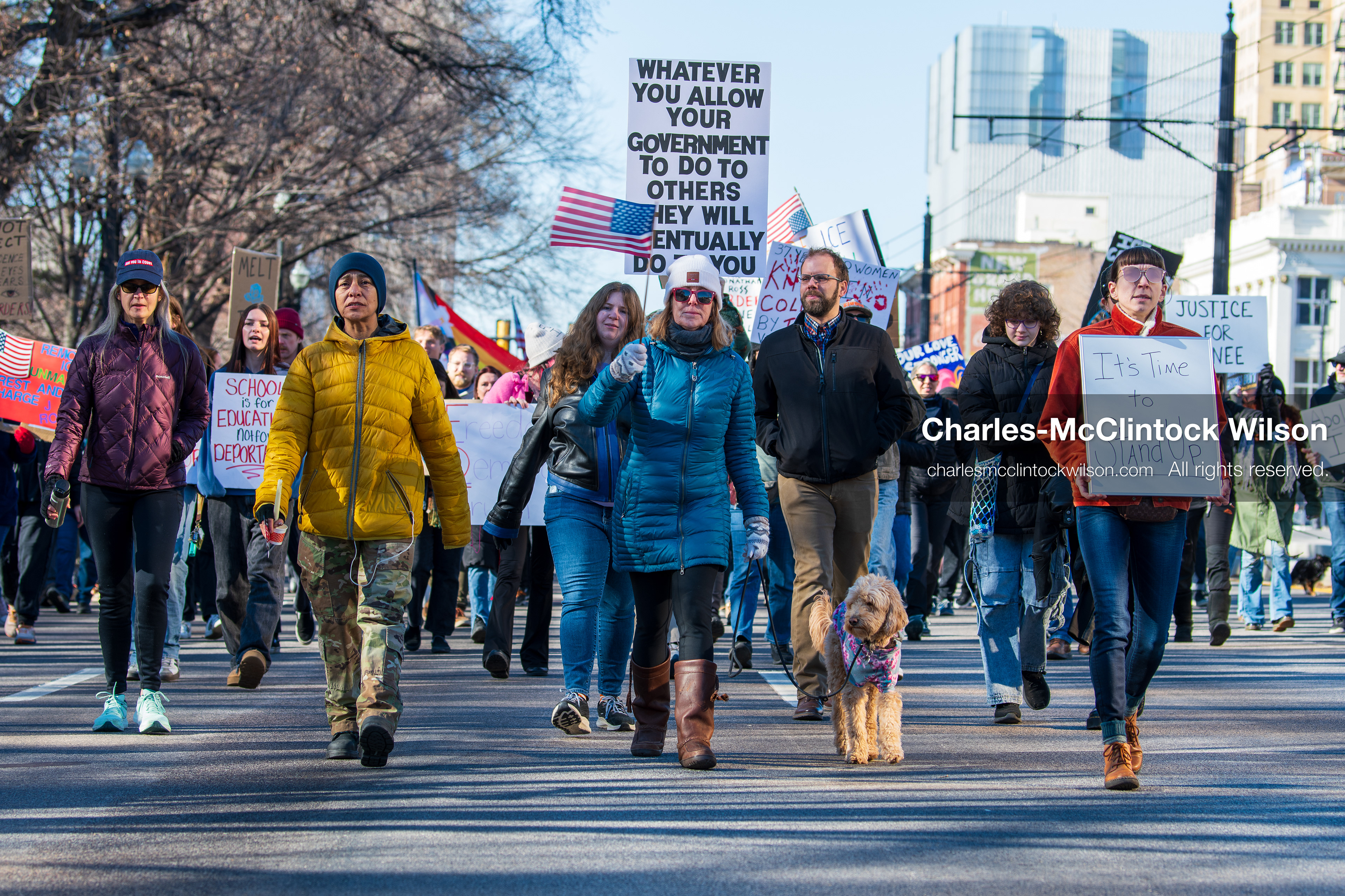 Salt Lake City, Utah, January 10, 2026: A group of demonstrators marches through downtown Salt Lake City during the ICE Out for Good protest, which began at Washington Square Park, with participants carrying signs and personal items as they walk together. (Credit Image: © Charles‑McClintock Wilson/ZUMA Press Wire)