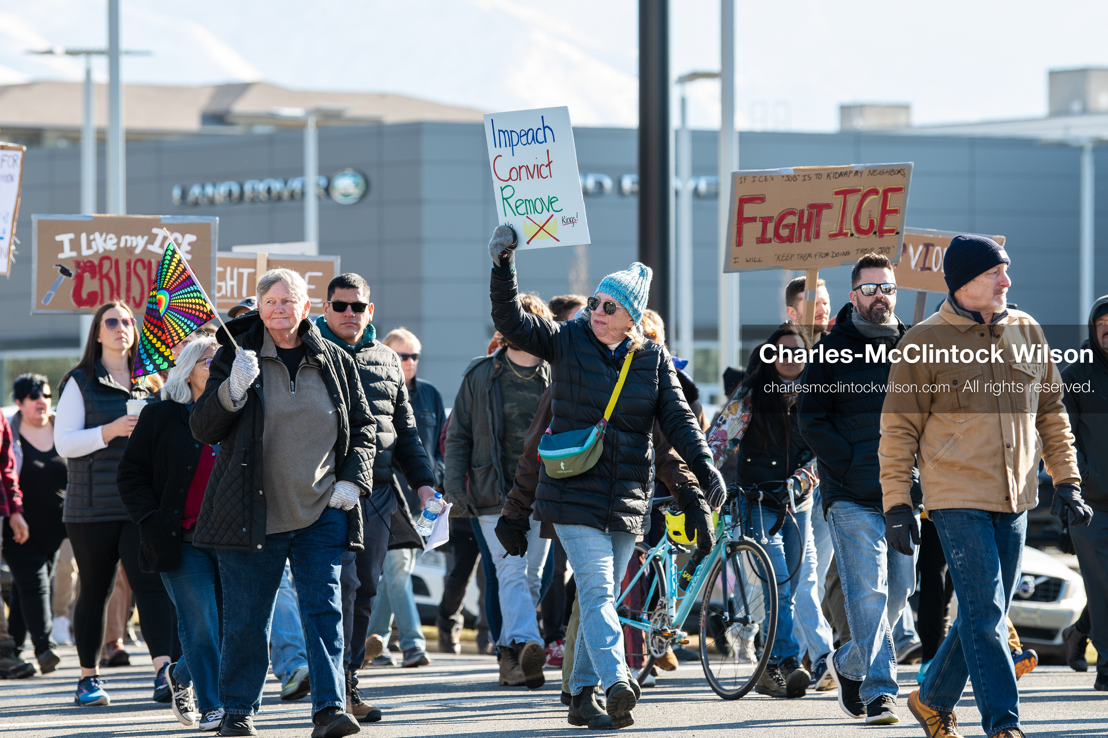 Salt Lake City, Utah, January 10, 2026: A group of demonstrators marches through downtown Salt Lake City during the ICE Out for Good protest, which began at Washington Square Park, with participants carrying signs and personal items as they walk together. (Credit Image: © Charles‑McClintock Wilson/ZUMA Press Wire)