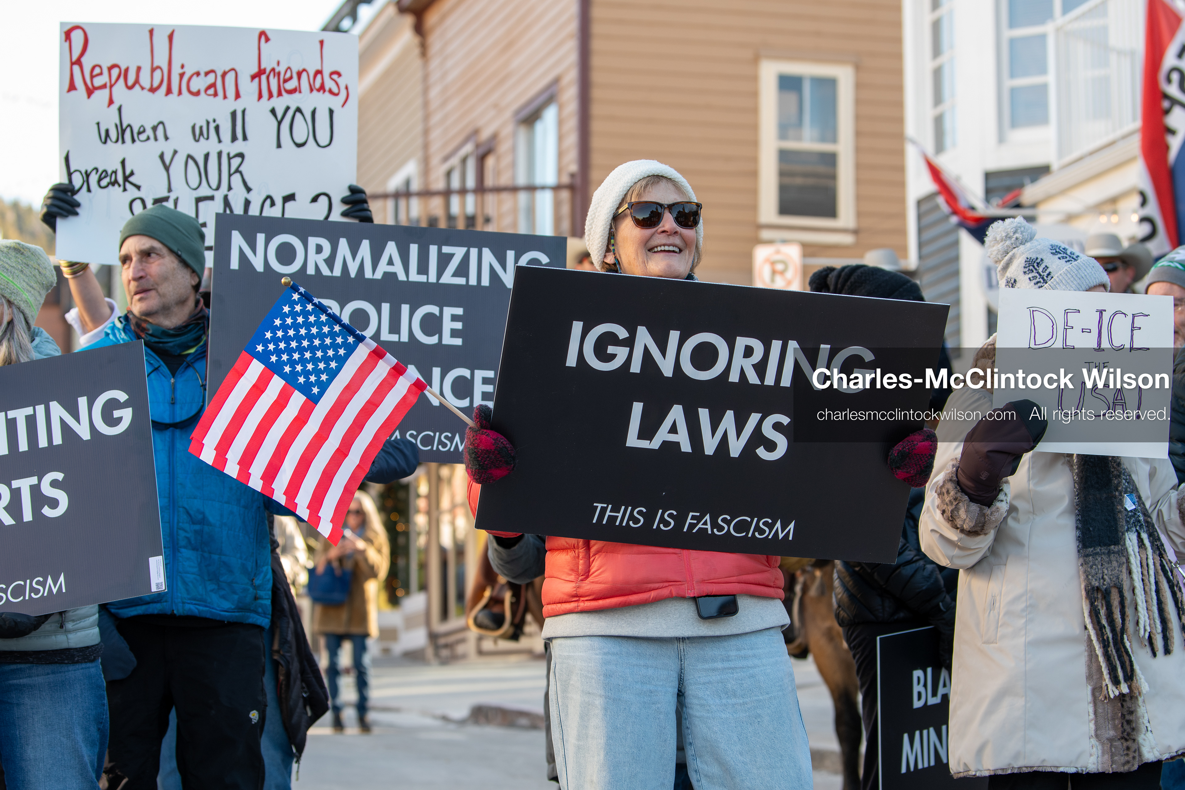 January 26, 2026, Park City, Utah, USA: Demonstrators gather on Main Street holding signs and American flags during a protest opposing U.S. Immigration and Customs Enforcement (I.C.E.) ICE agents at the Sundance Film Festival in Park City, Utah, on Monday, Jan. 26, 2026. The event was held in response to the fatal shooting of Alex Pretti by a U.S. Border Patrol officer in Minneapolis. (Credit Image: © Charles McClintock Wilson/ZUMA Press Wire)