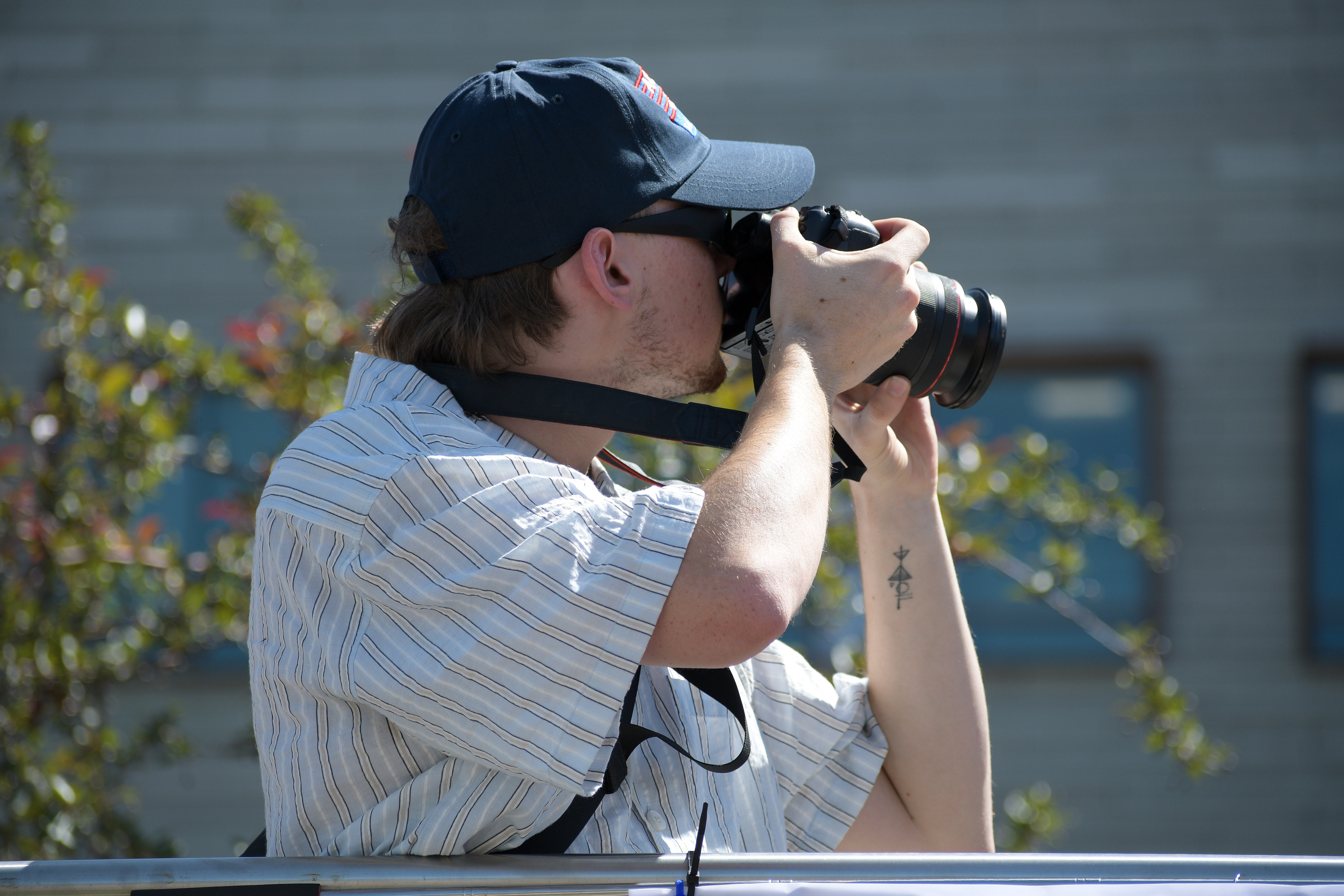 SALT LAKE CITY, UTAH – JUNE 15, 2025: A photojournalist captures scenes at the “No Kings” protest on the University of Utah campus, documenting the event as it unfolded.