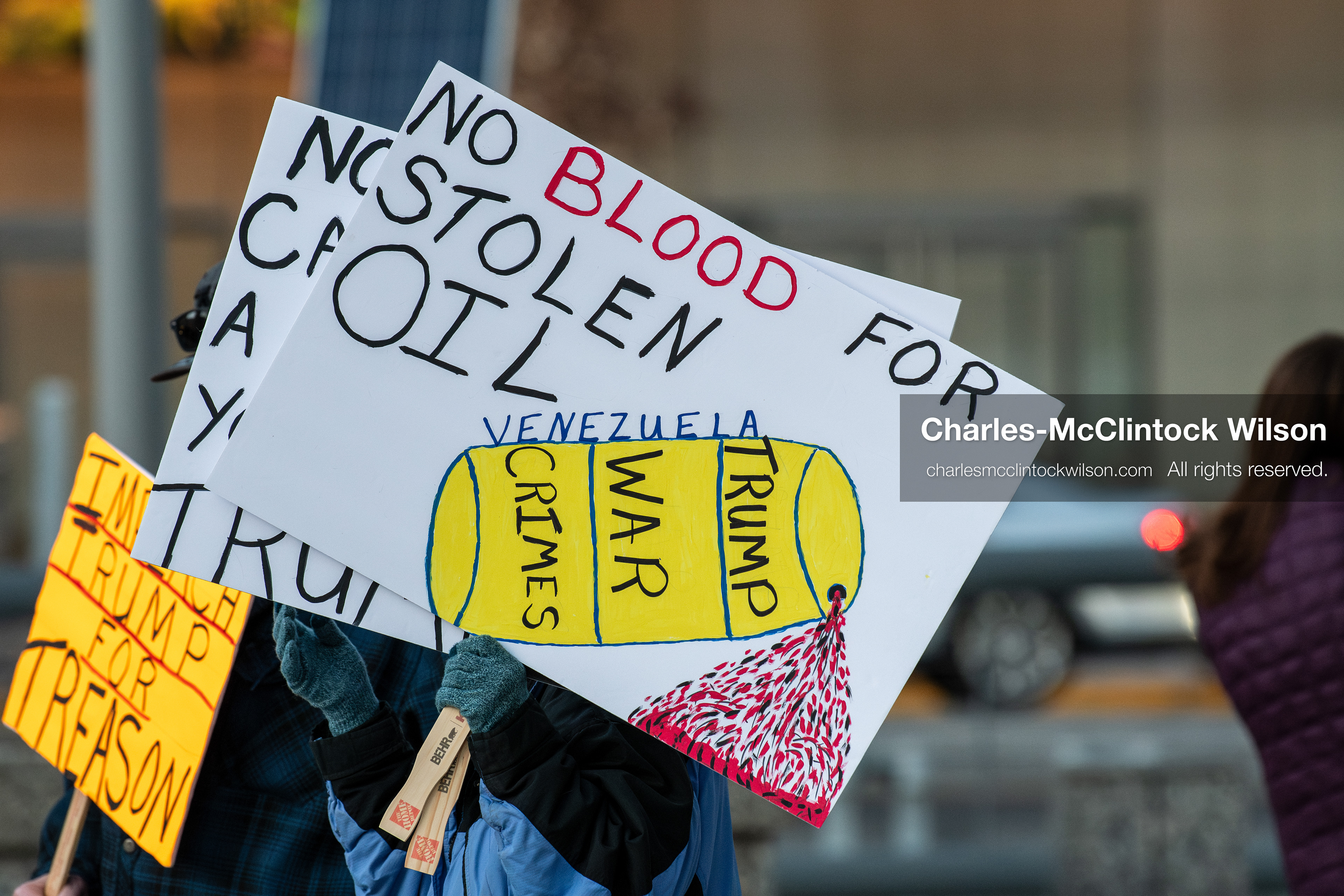 January 5, 2026, Salt Lake City, Utah, USA: Demonstrators hold signs during a protest outside the Wallace Federal Building in Salt Lake City, Utah. The rally, organized by Salt Lake Indivisible, called for congressional limits on presidential war powers following recent US military actions in Venezuela involving the government of Nicolas Maduro. (Credit Image: (c) Charles‑McClintock Wilson/ZUMA Press Wire)