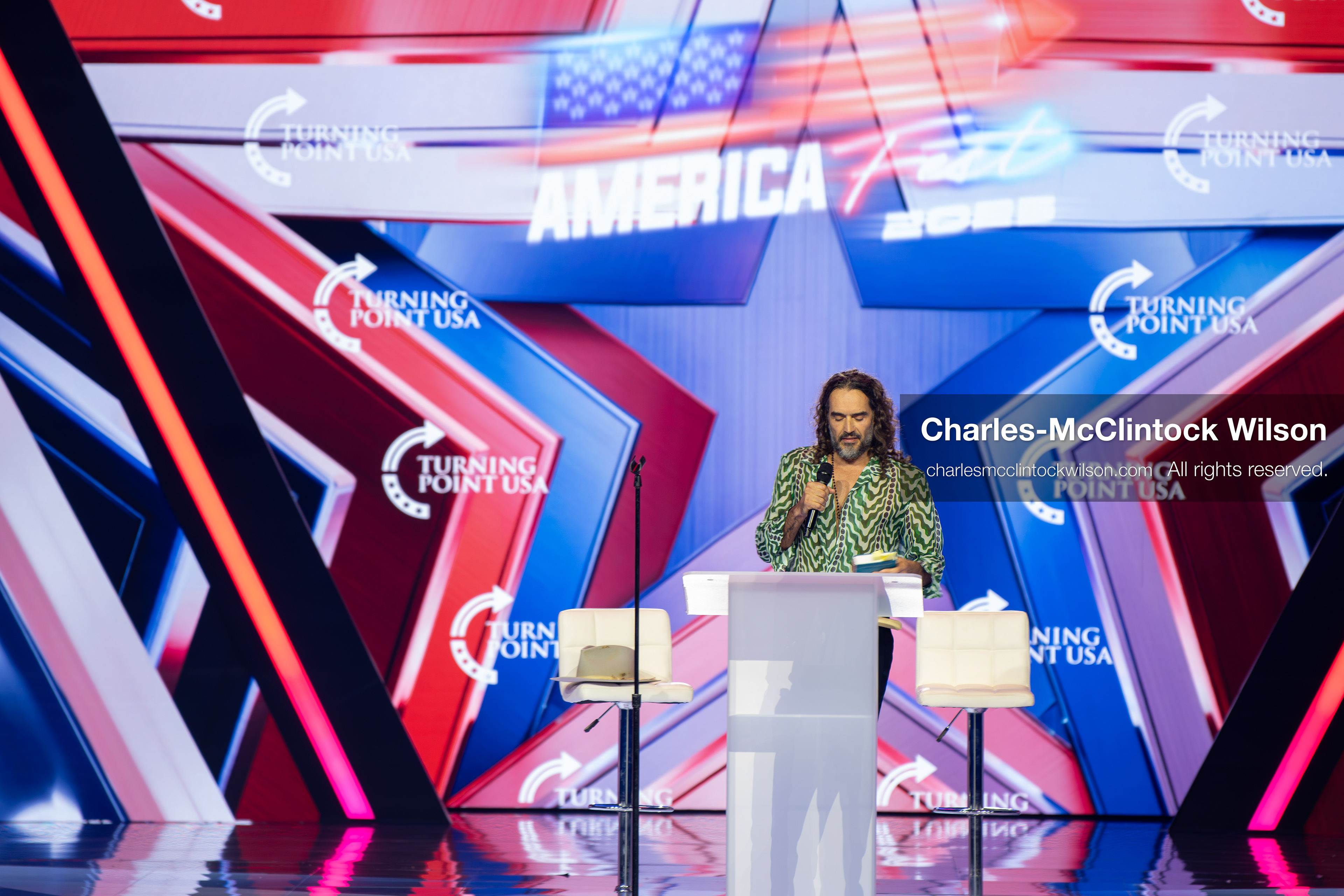 December 18, 2025, Phoenix, Arizona, USA: Russell Brand speaks during Day One of Turning Point USA’s AmericaFest 2025 at the Phoenix Convention Center in Phoenix, Arizona.   (Credit Image: © Charles‑McClintock Wilson/ZUMA Press Wire)