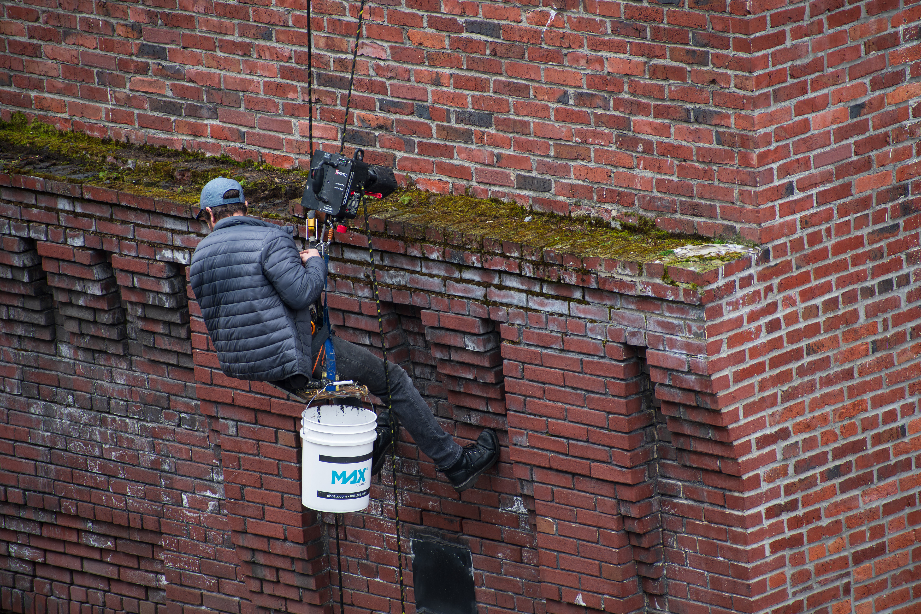 SEATTLE, WA, USA - APR 12, 2025: A man seen working in Downtown Seattle, Washington, USA. Washington state's economy is diverse and strong, with key industries including technology and aerospace.