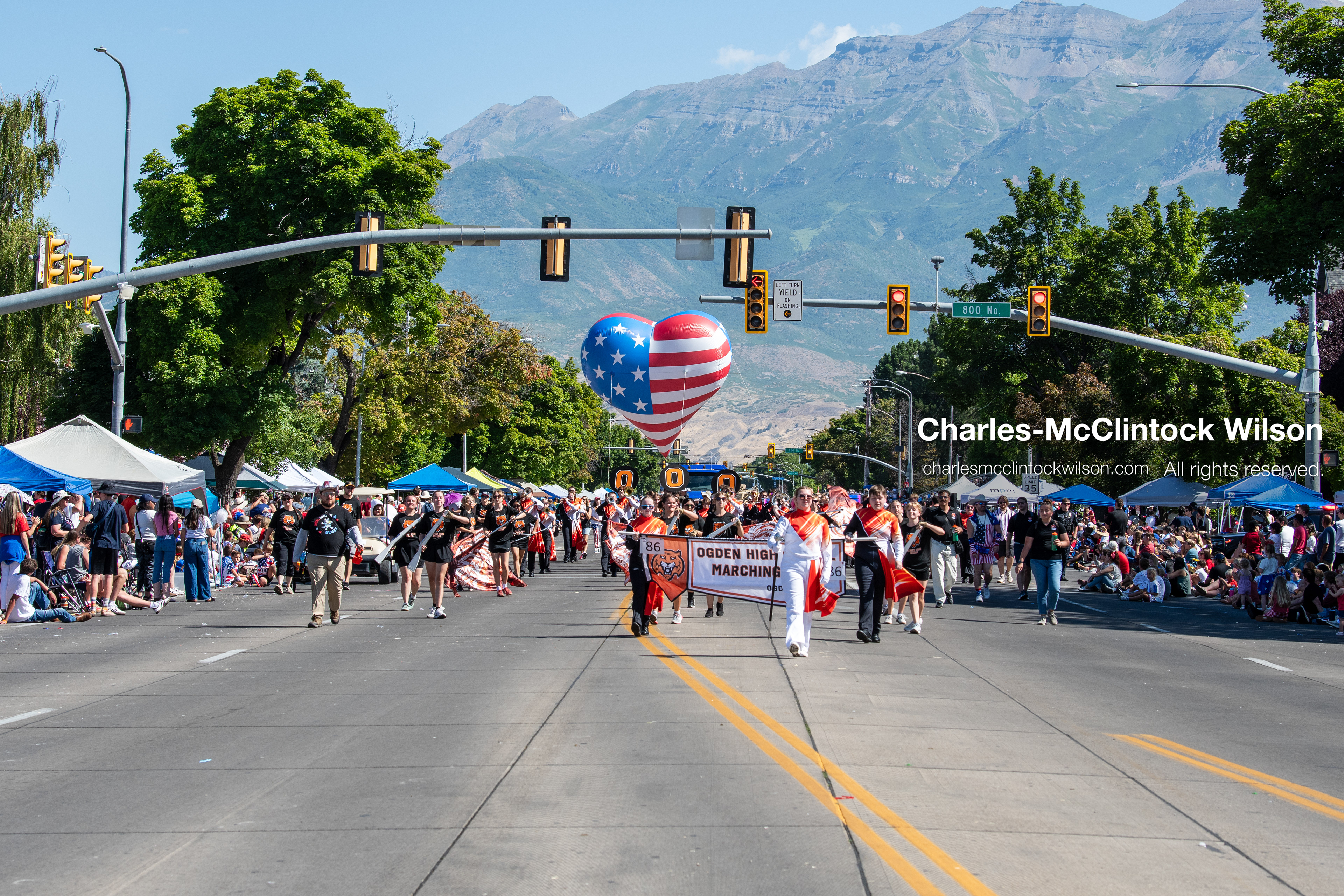 July 4, 2026, Provo, Utah, USA: Members of a high school marching band dressed in maroon and black uniforms play brass instruments while marching down the street during America's Freedom Festival Grand Parade in Provo, Utah, Saturday, July 4, 2026. The annual Independence Day event features expanded programming to honor the 250th anniversary of United States independence. (Credit Image: © Charles-McClintock Wilson/ZUMA Press Wire)