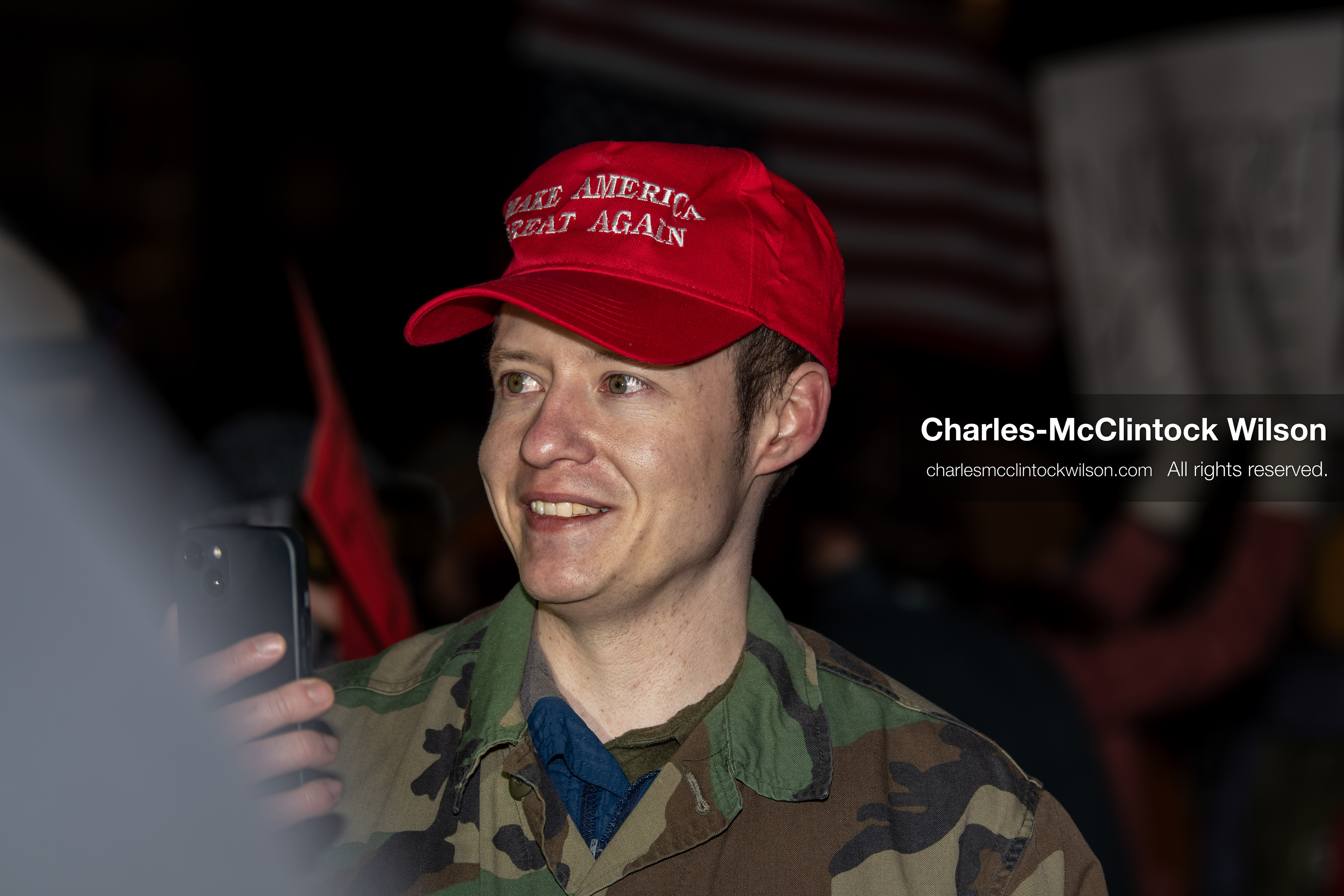 January 8, 2026, Salt Lake City, Utah, USA: A demonstrator wearing a Make America Great Again hat stands at Pioneer Park in Salt Lake City Utah during an anti ICE protest on Jan 8 2026. The rally followed the death of Renee Nicole Good during an encounter with immigration authorities in Minneapolis and drew hundreds calling for accountability and changes to enforcement practices. (Credit Image: © Charles-McClintock Wilson/ZUMA Press Wire)