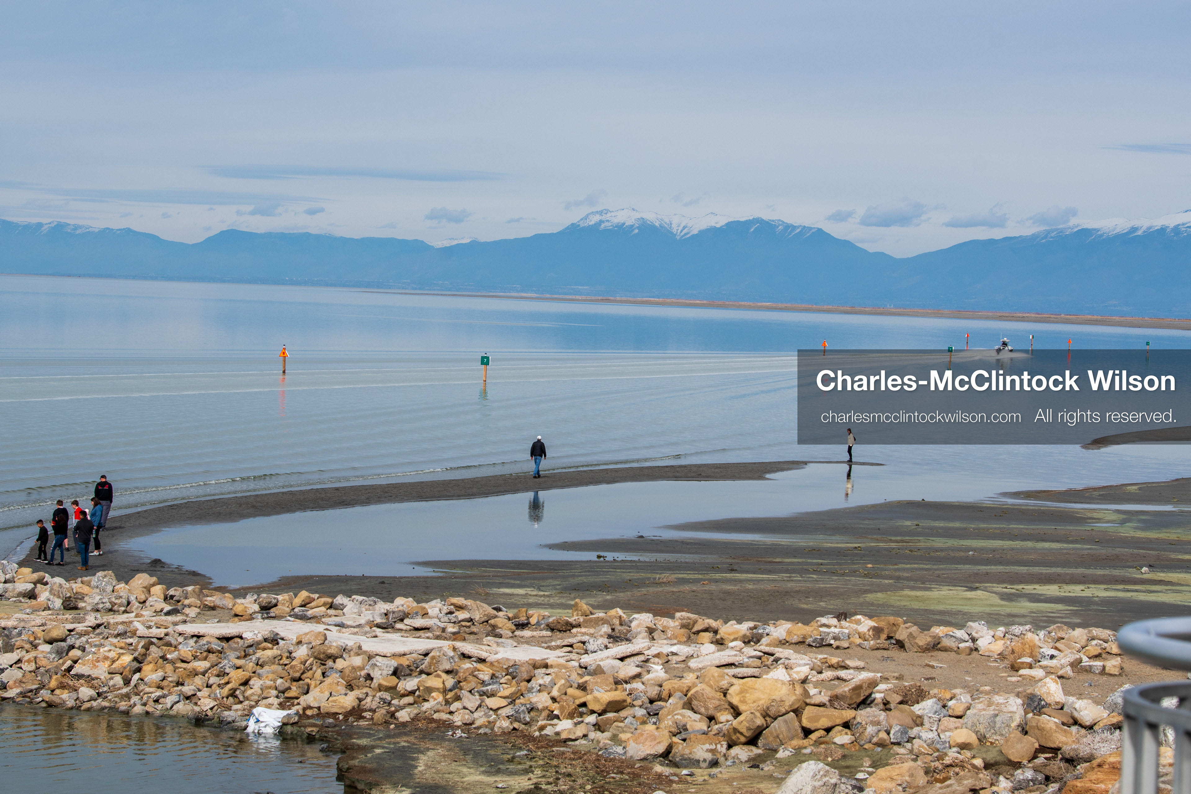 March 1, 2026, Great Salt Lake, Utah, USA: People walk along the shoreline of the Great Salt Lake as water levels remain historically low. Reports from state officials and the Great Salt Lake Strike Team state that the lake continues to fall within a serious adverse‑effects range, with elevations among the lowest recorded in more than one hundred years. The lake has drawn increased public attention as lawmakers consider large‑scale water projects and long‑term plans to address declining conditions. (Credit Image: © Charles‑McClintock Wilson/ZUMA Press Wire)