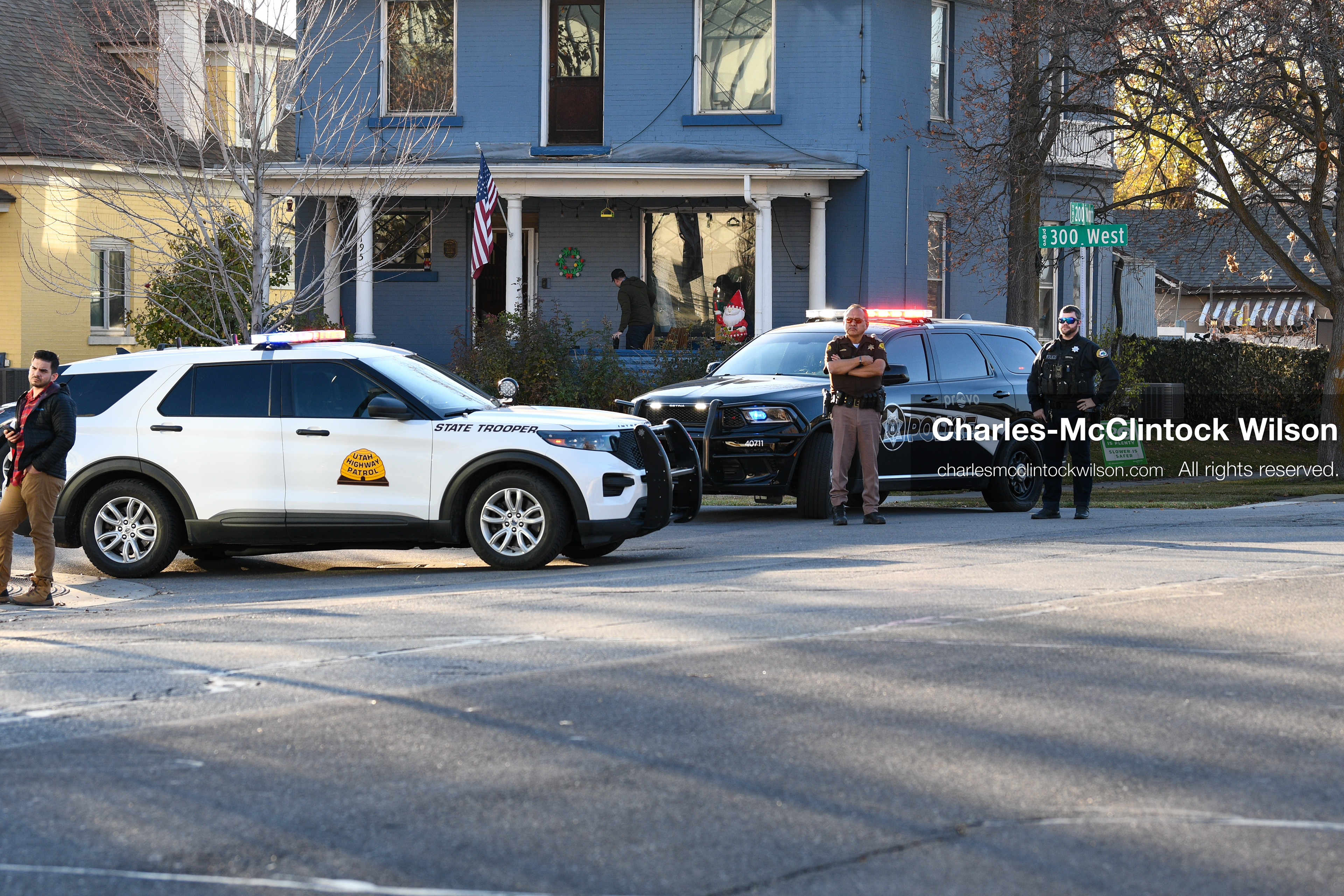 PROVO, UTAH, USA – DECEMBER 11, 2025: A Provo Police officer and a Utah Highway Patrol trooper stand outside the Fourth District Court in Provo during the first in‑person court appearance of Tyler Robinson in the Charlie Kirk murder case. (Credit Image: © Charles‑McClintock Wilson/ZUMA Press Wire)