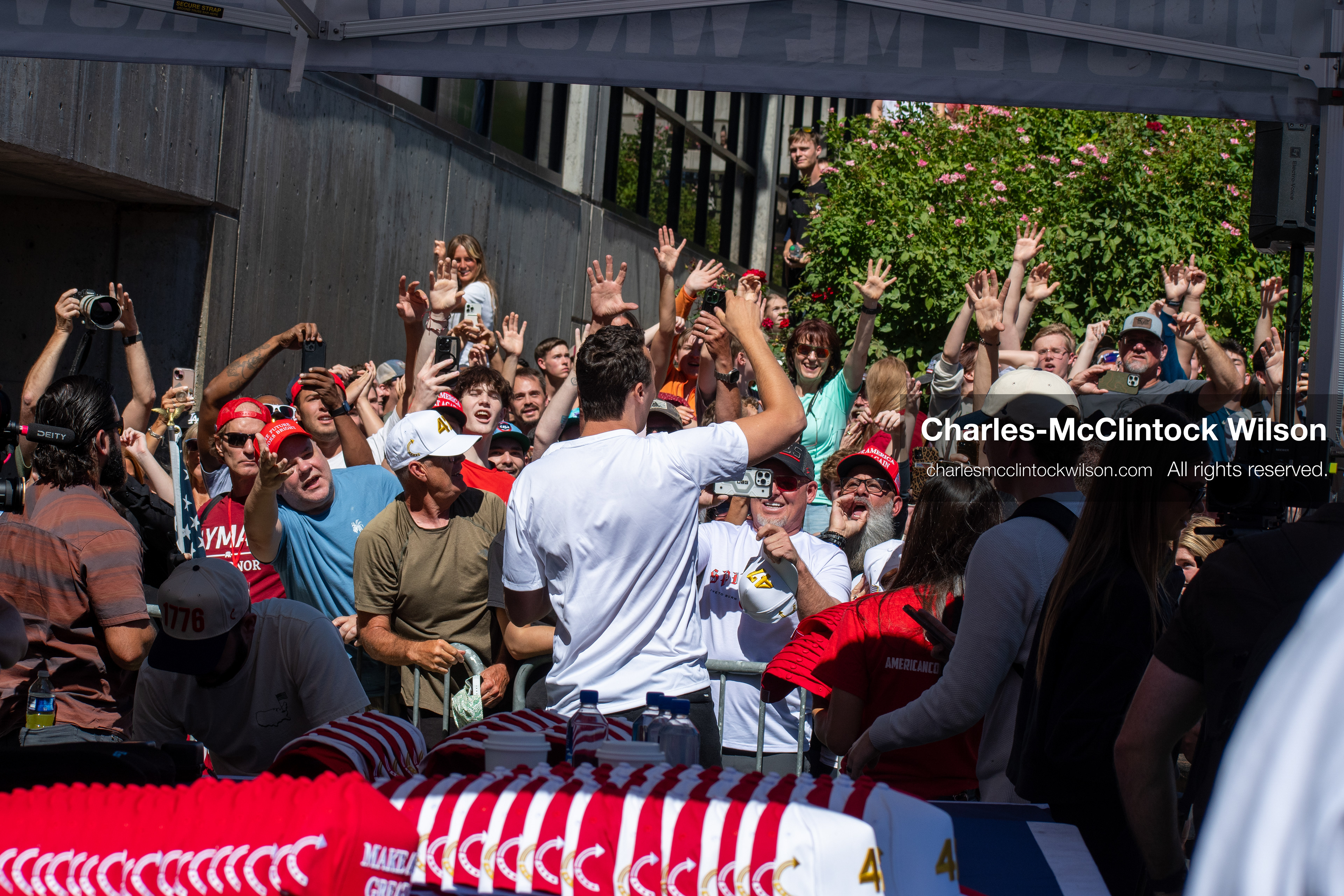 OREM, UTAH – SEPTEMBER 10, 2025: Conservative activist Charlie Kirk greets supporters at Utah Valley University during a public appearance that drew thousands. Known for his outspoken political commentary and youth mobilization efforts, Kirk engaged directly with attendees in the UVU Courtyard, where supporters responded with raised hands, cheers, and visible enthusiasm. The image captures a moment of energized political engagement shortly before the shooting incident that disrupted the event. (Photo by Charles-McClintock Wilson/ZUMA Press Wire)