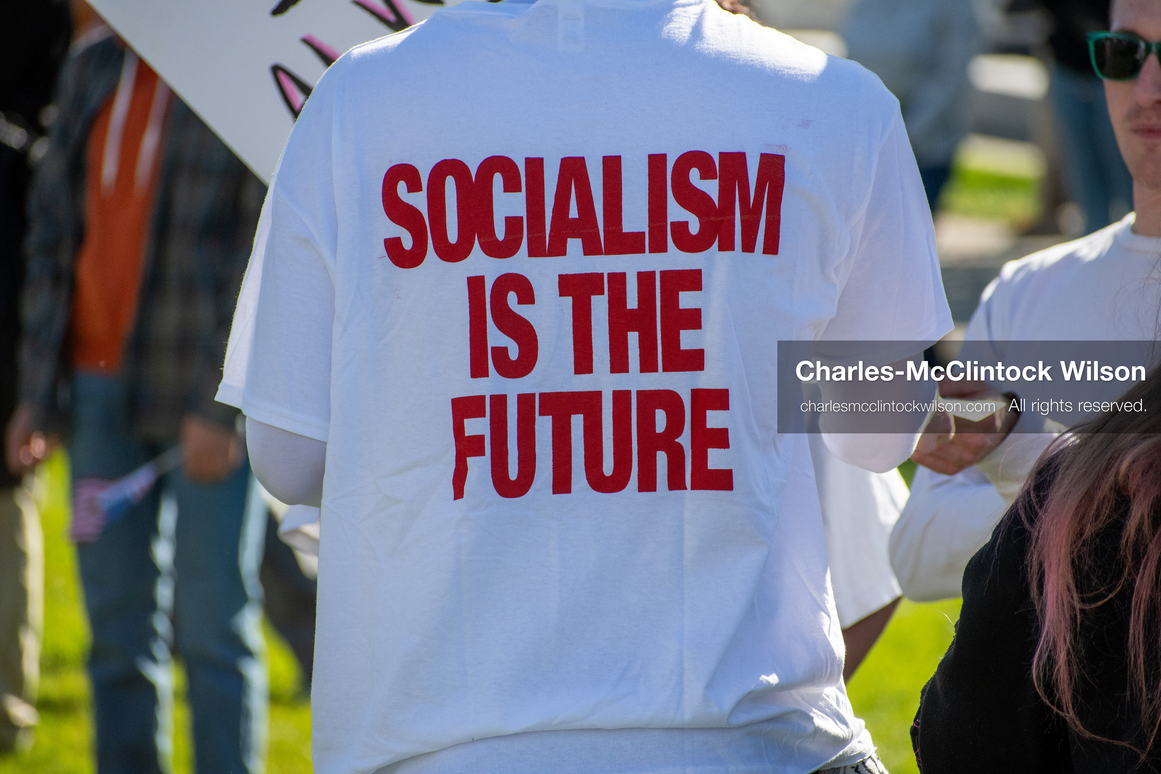 October 18, 2025, Salt Lake City, Utah, USA: A demonstrator wears a T-shirt with a political message during a "No Kings" protest at the Utah State Capitol. The protest was part of a nationwide mobilization.