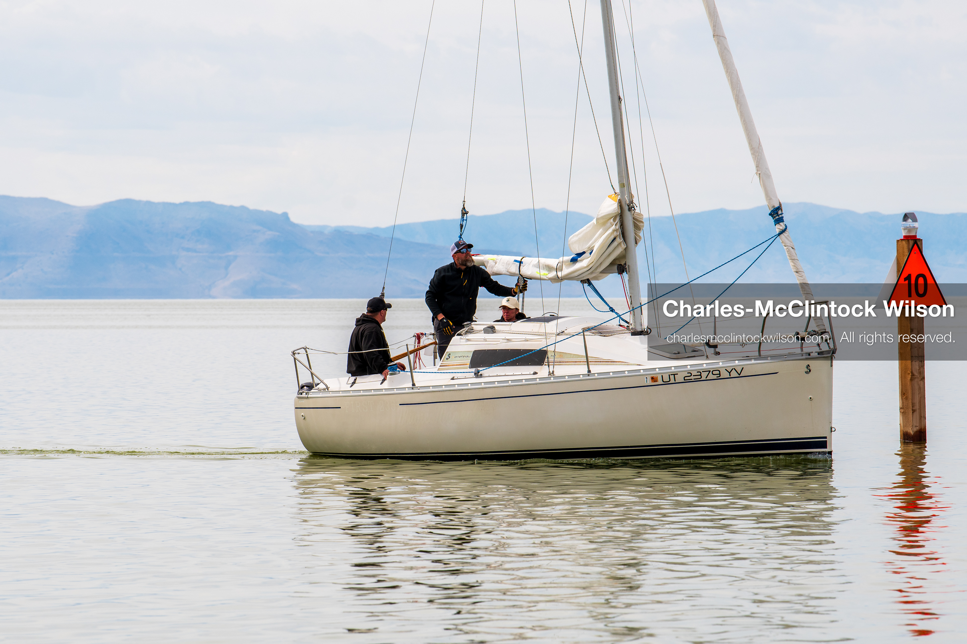March 1, 2026, Great Salt Lake, Utah, USA: A sailboat moves across calm water at the Great Salt Lake as the region continues to experience historically low water levels. Reports from state officials and the Great Salt Lake Strike Team state that the lake remains in a serious adverse‑effects range, with elevations among the lowest recorded in more than one hundred years. The lake has drawn increased public attention as lawmakers consider large‑scale water projects and long‑term plans to address declining conditions. (Credit Image: © Charles‑McClintock Wilson/ZUMA Press Wire)
