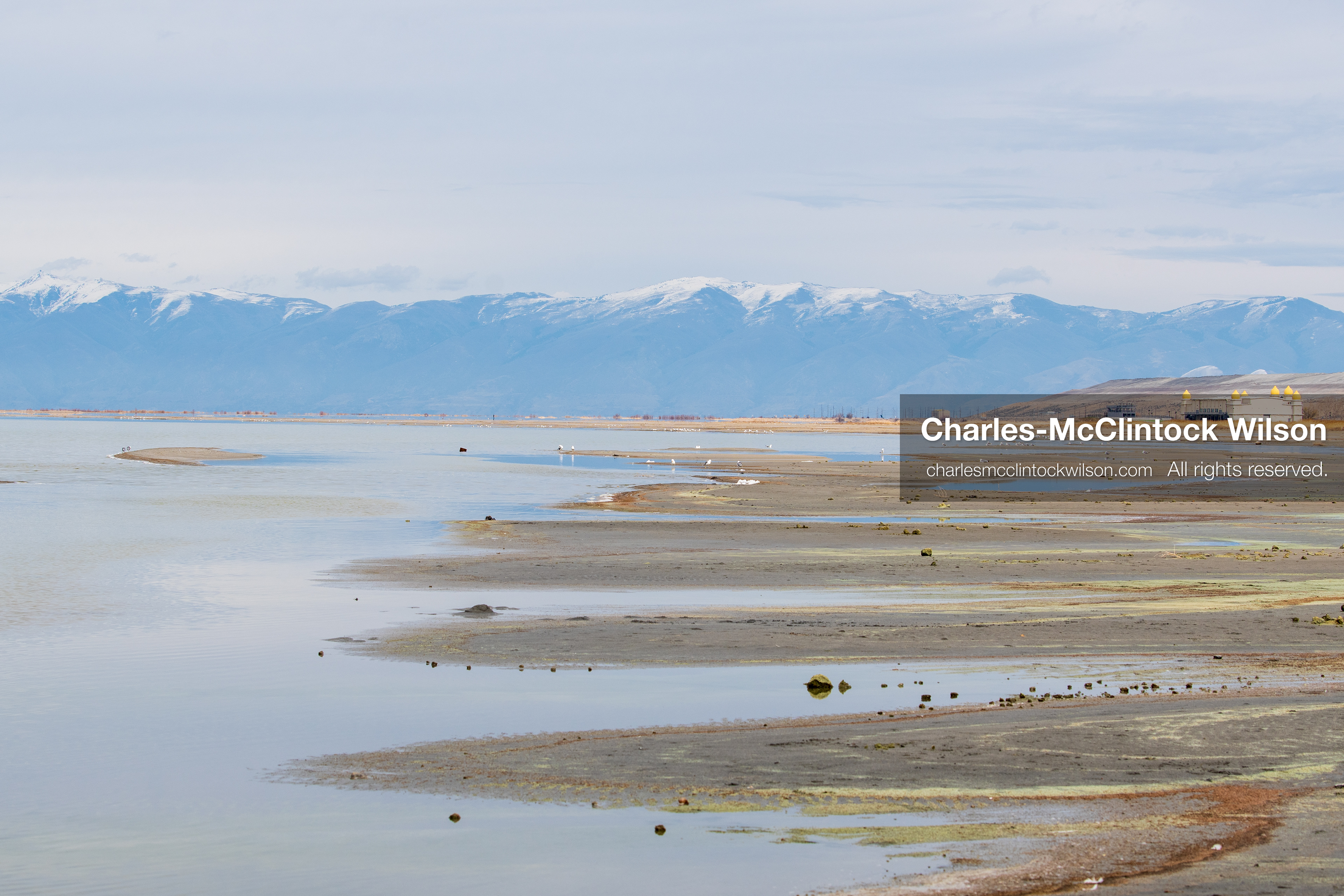 March 1, 2026, Great Salt Lake, Utah, USA: Shoreline, mudflats, and distant snow‑covered mountains are seen at the Great Salt Lake as the region continues to experience historically low water levels. Reports from state officials and the Great Salt Lake Strike Team state that the lake remains in a serious adverse‑effects range, with elevations among the lowest recorded in more than one hundred years. The lake has drawn increased public attention as lawmakers consider large‑scale water projects and long‑term plans to address declining conditions. (Credit Image: © Charles‑McClintock Wilson/ZUMA Press Wire)