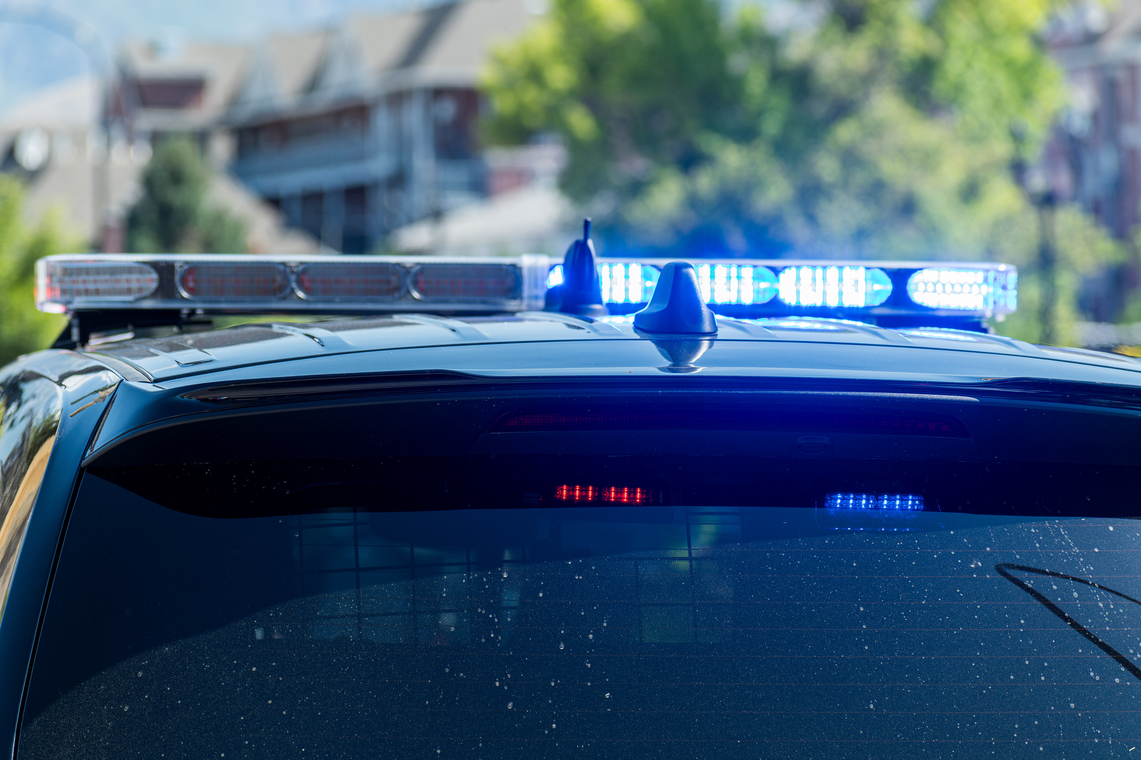 Provo, Utah – July 4, 2025: Flashing lights of a Provo Police Department cruiser are seen during the Freedom Festival Grand Parade in downtown Provo.