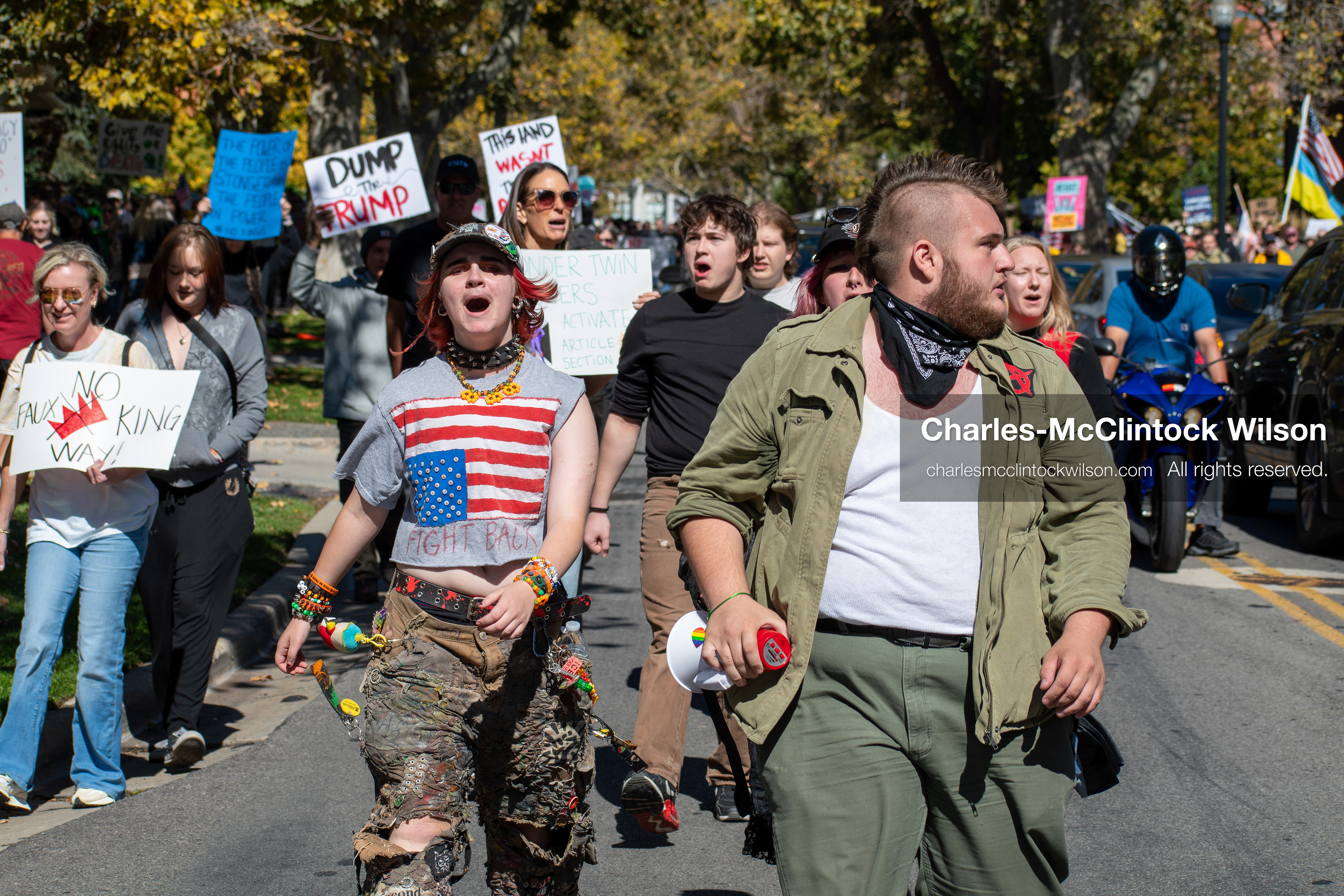 October 18, 2025, Salt Lake City, Utah, USA: Demonstrators march along South State Street during a "No Kings" protest in Salt Lake City, Utah. The protest was part of a nationwide mobilization.