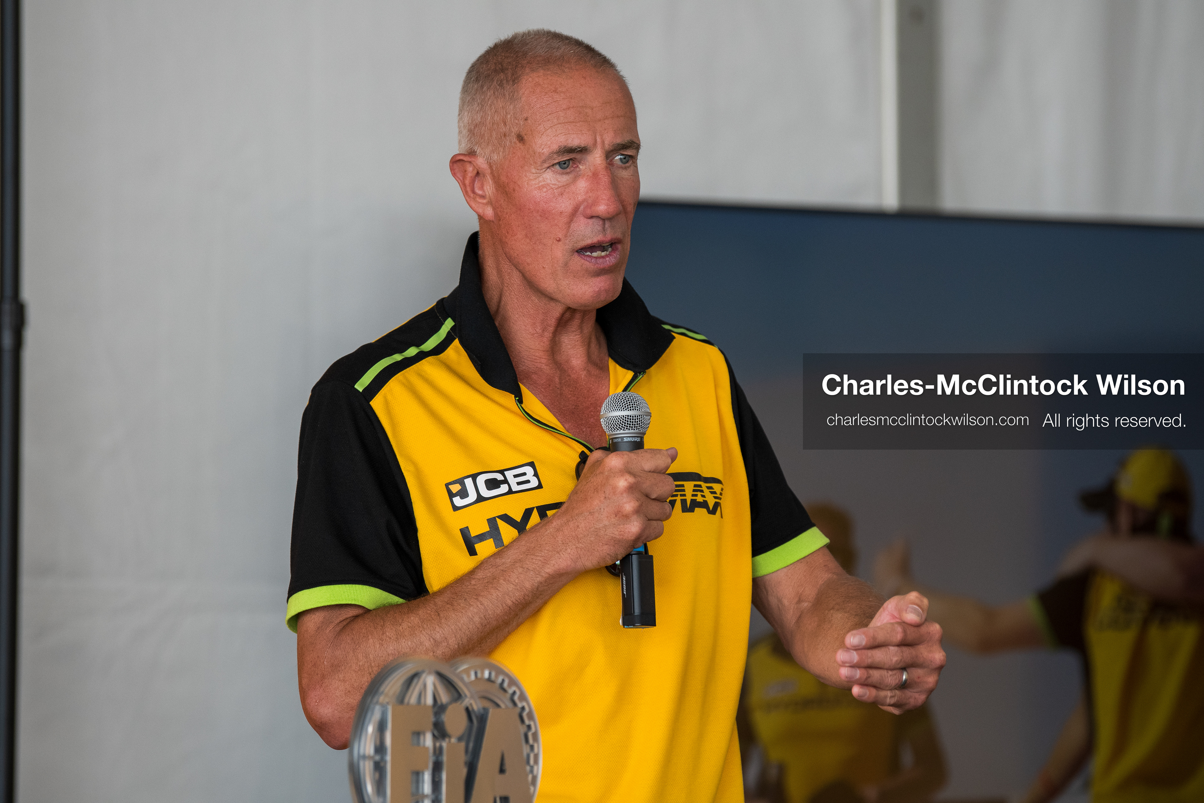  August 11, 2026, Wendover, Utah, USA: British pilot ANDY GREEN speaks into a microphone during a press conference at the Bonneville Salt Flats on Tuesday. Green piloted the hydrogen-powered ''JCB Hydromax'' streamliner to a historic record-breaking top speed of 406.320 mph. (Credit Image: © Charles McClintock Wilson/ZUMA Press Wire)