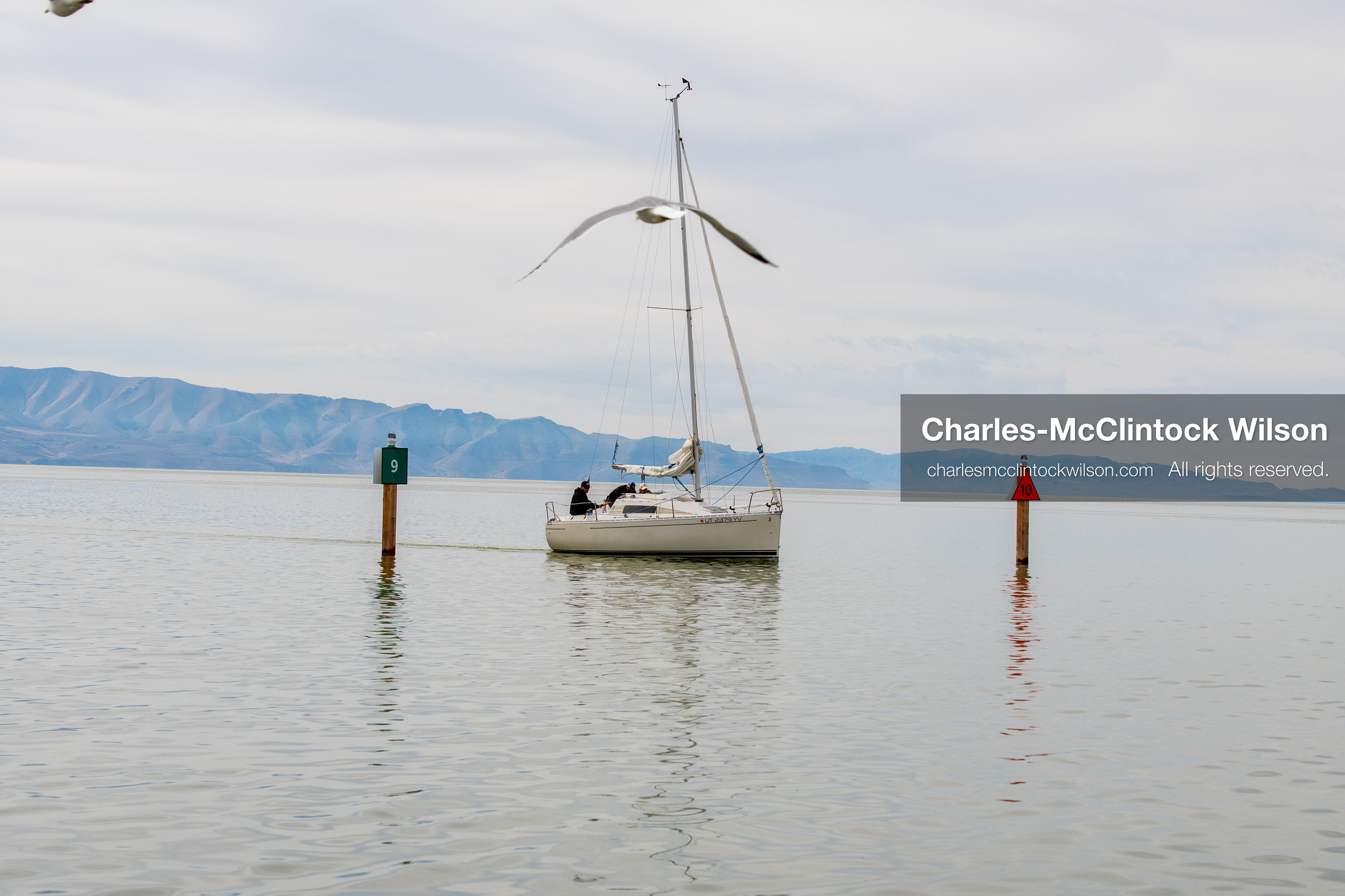 March 1, 2026, Great Salt Lake, Utah, USA: A sailboat moves across calm water at the Great Salt Lake as the region continues to experience historically low water levels. Reports from state officials and the Great Salt Lake Strike Team state that the lake remains in a serious adverse‑effects range, with elevations among the lowest recorded in more than one hundred years. The lake has drawn increased public attention as lawmakers consider large‑scale water projects and long‑term plans to address declining conditions. (Credit Image: © Charles‑McClintock Wilson/ZUMA Press Wire)