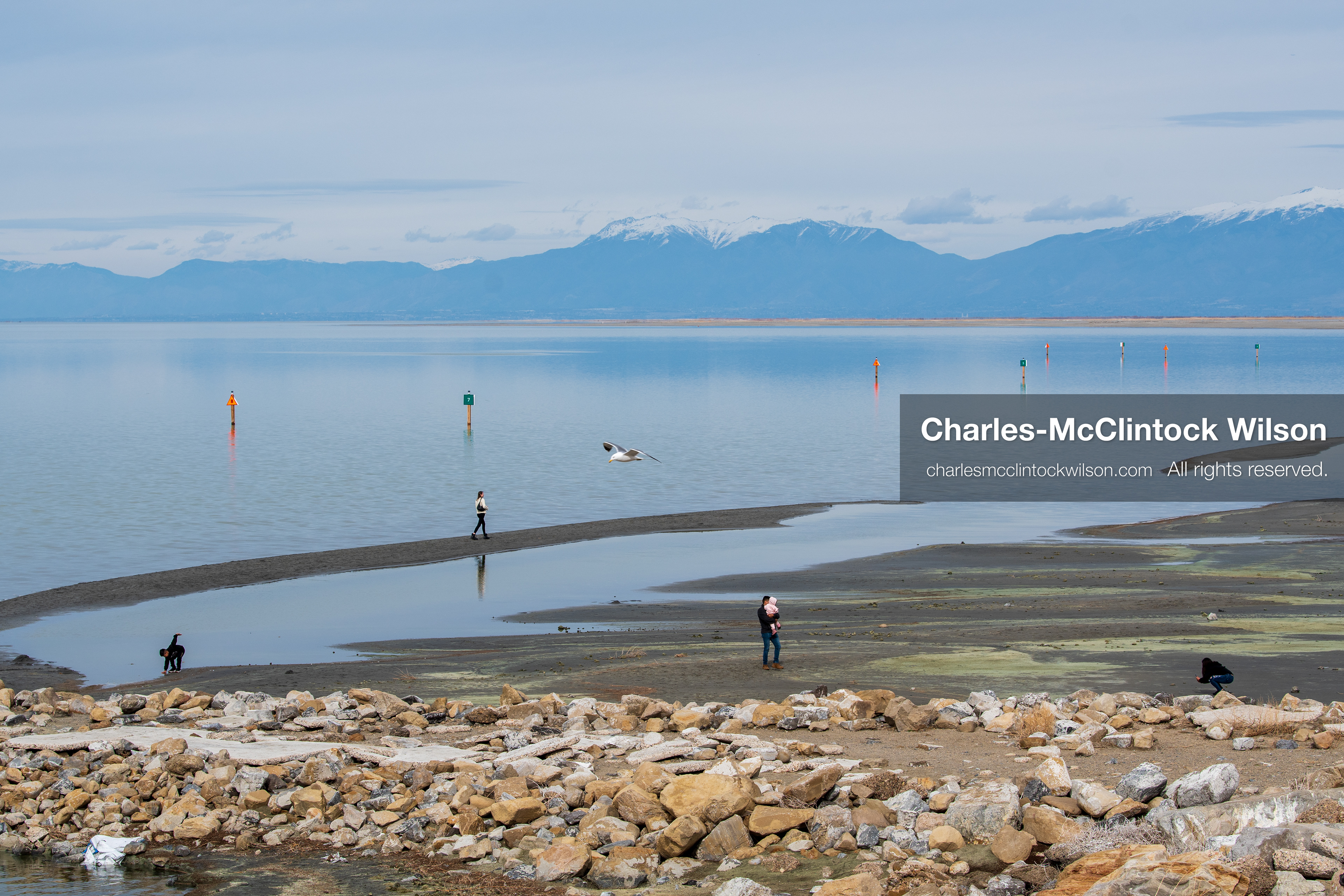 March 1, 2026, Great Salt Lake, Utah, USA: People walk along the shoreline of the Great Salt Lake as water levels remain historically low. Reports from state officials and the Great Salt Lake Strike Team state that the lake continues to fall within a serious adverse‑effects range, with elevations among the lowest recorded in more than one hundred years. The lake has drawn increased public attention as lawmakers consider large‑scale water projects and long‑term plans to address declining conditions. (Credit Image: © Charles‑McClintock Wilson/ZUMA Press Wire)