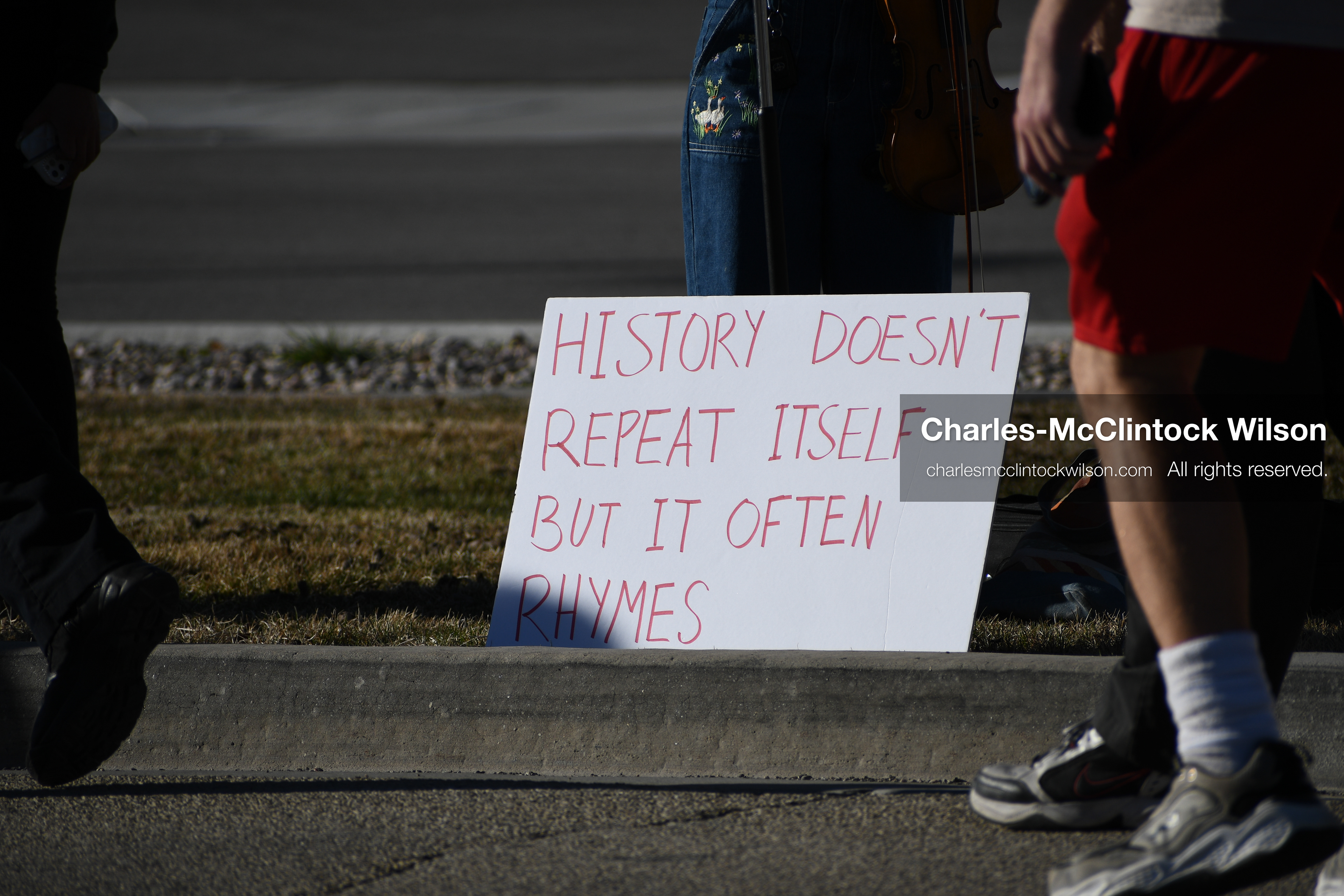 March 18, 2026, Salt Lake City, Utah, USA: A protest sign rests on the sidewalk during a demonstration at the site of a proposed ICE detention facility on the west side of Salt Lake City. People gathered near the warehouse property as part of a community response to the planned use of the location. (Credit Image: © Charles McClintock Wilson/ZUMA Press Wire)