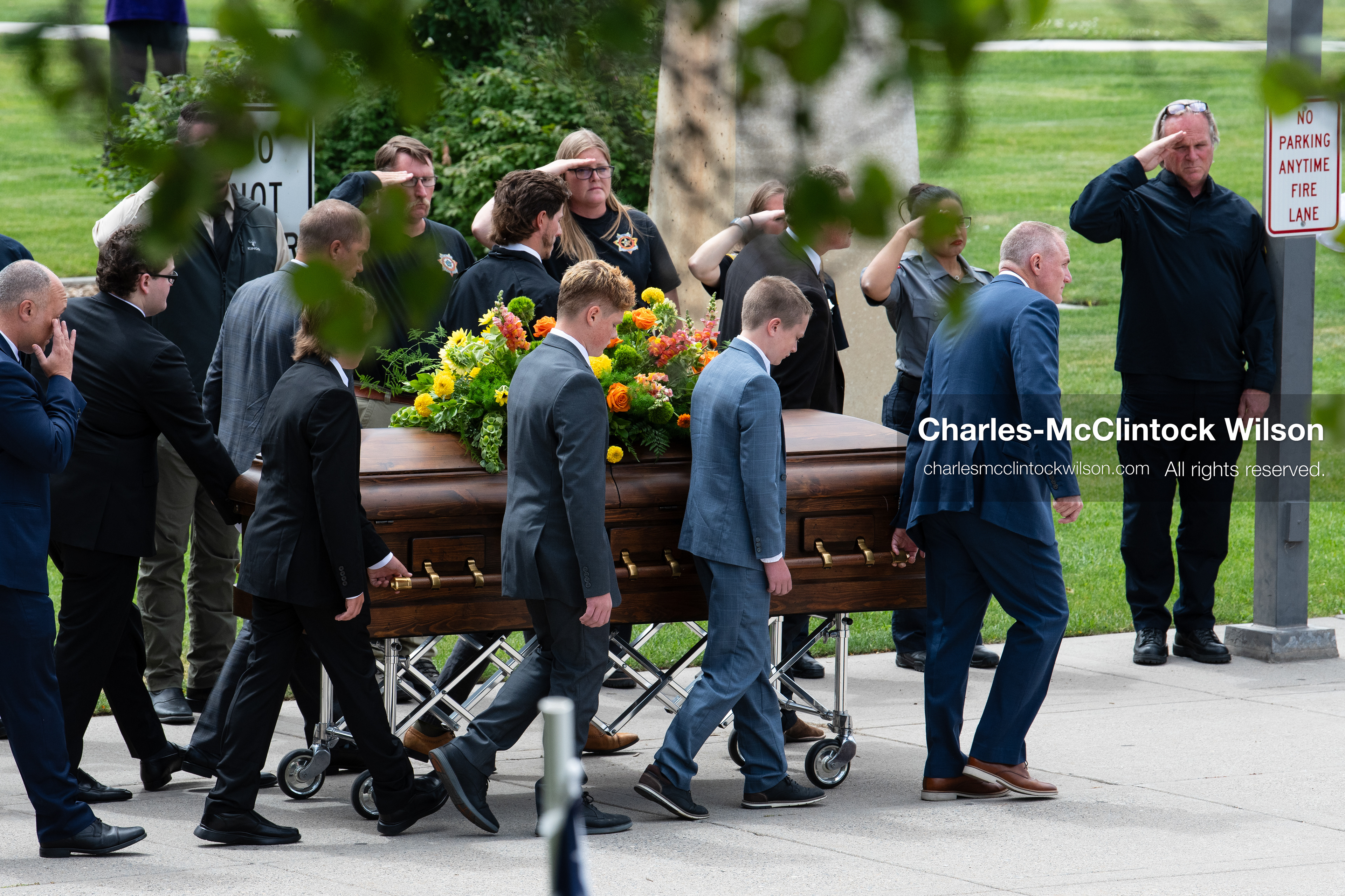 Pallbearers and family members escort the casket of a Long family member outside the UCCU Center at Utah Valley University in Orem, Utah, on Wednesday, July 29, 2026. More than 300 people came to the public memorial ceremony to honor Provo Fire Captain Spencer Long, his wife Katrina, and three of their sons, who died after a flash flood hit their campsite near the Sunglow Campground in Wayne County. (Photo by Charles-McClintock Wilson/Sipa USA)