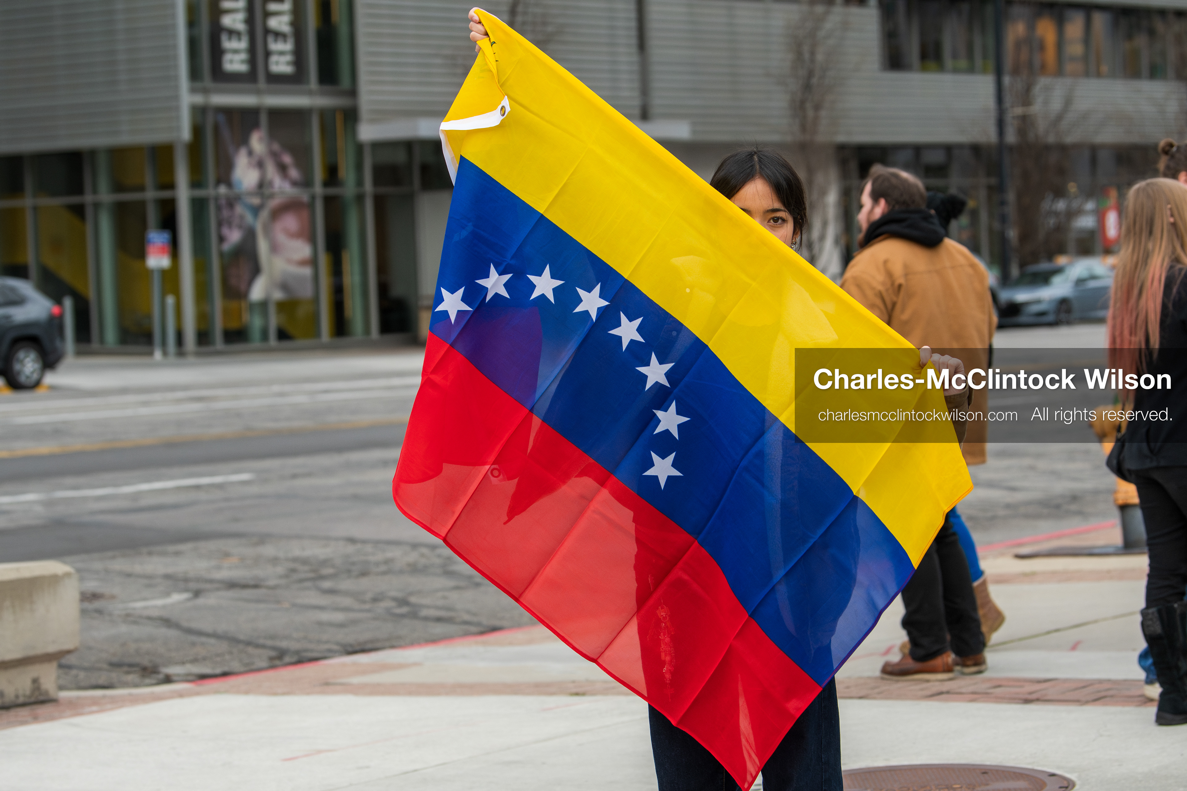 January 3, 2026, Salt Lake City, Utah, USA: A protester holds a Venezuelan flag during a demonstration against US action in Venezuela outside the Wallace Federal Building in Salt Lake City, Utah. The protest was part of a nationwide mobilization responding to recent military developments. (Credit Image: (c) Charles‑McClintock Wilson/ZUMA Press Wire)