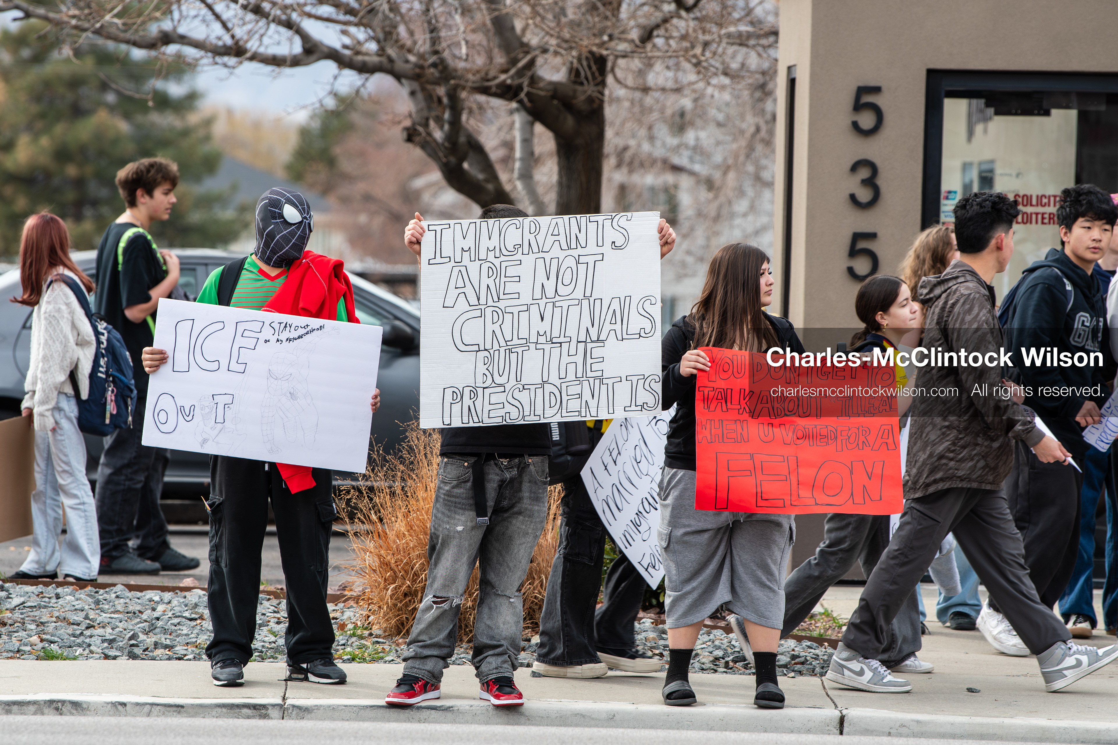 February 11, 2026, Orem, Utah, USA: Students stand on the sidewalk along State Street during a student‑led protest involving participants from multiple Orem schools. (Credit Image: © Charles‑McClintock Wilson/ZUMA Press Wire)