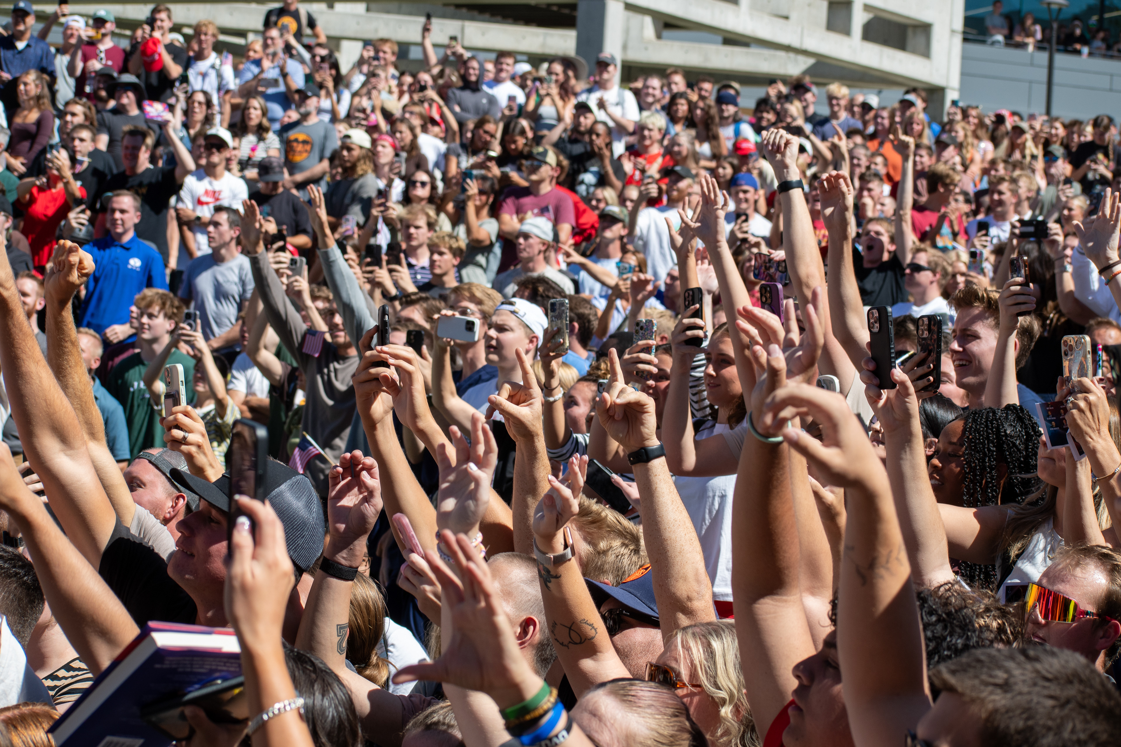 OREM, UTAH – SEPTEMBER 10, 2025: Attendees gather in close formation at Utah Valley University for the opening stop of the American Comeback Tour. The image captures a moment of shared anticipation and civic presence, reflecting the energy, emotion, and communal engagement that defined the event’s intended spirit. © Charles-McClintock Wilson / ZUMA Press
