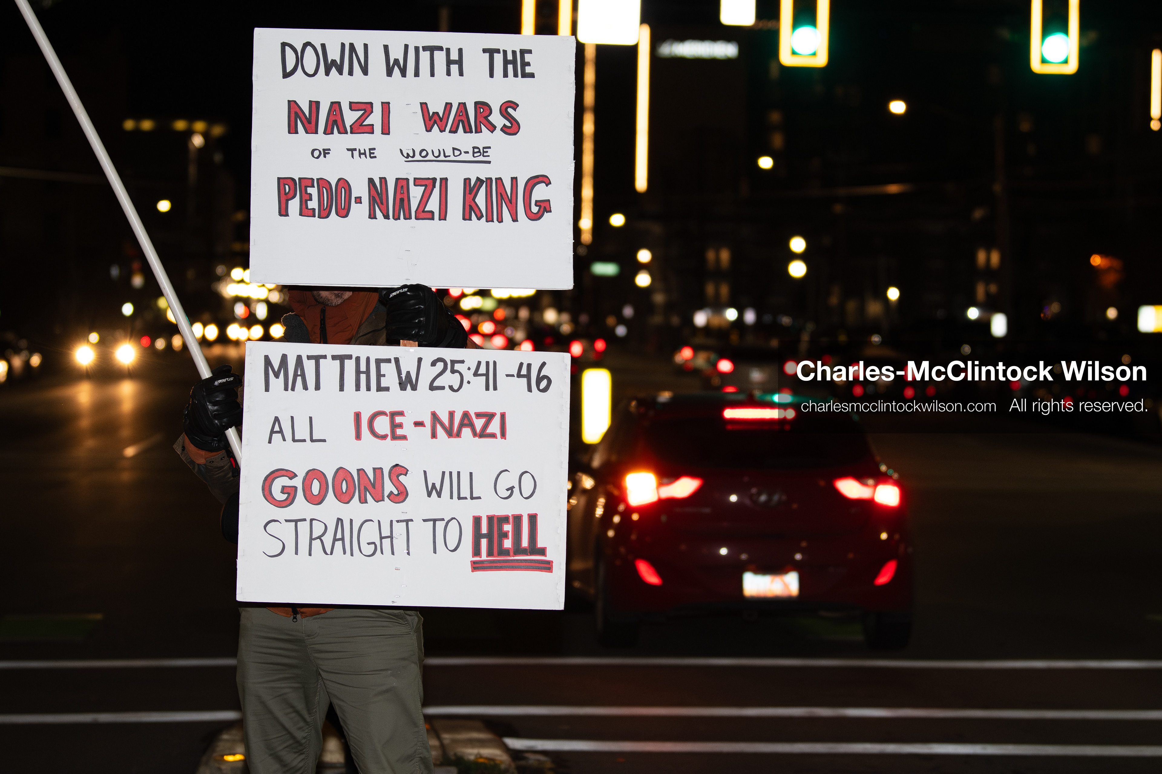 January 8, 2026, Salt Lake City, Utah, USA: A demonstrator holds two signs during an anti ICE protest at Pioneer Park in Salt Lake City Utah on Jan 8 2026. The rally followed the death of Renee Nicole Good a Minneapolis woman who was fatally shot during an encounter with immigration authorities and drew hundreds calling for accountability and changes to enforcement practices. (Credit Image: © Charles-McClintock Wilson/ZUMA Press Wire)