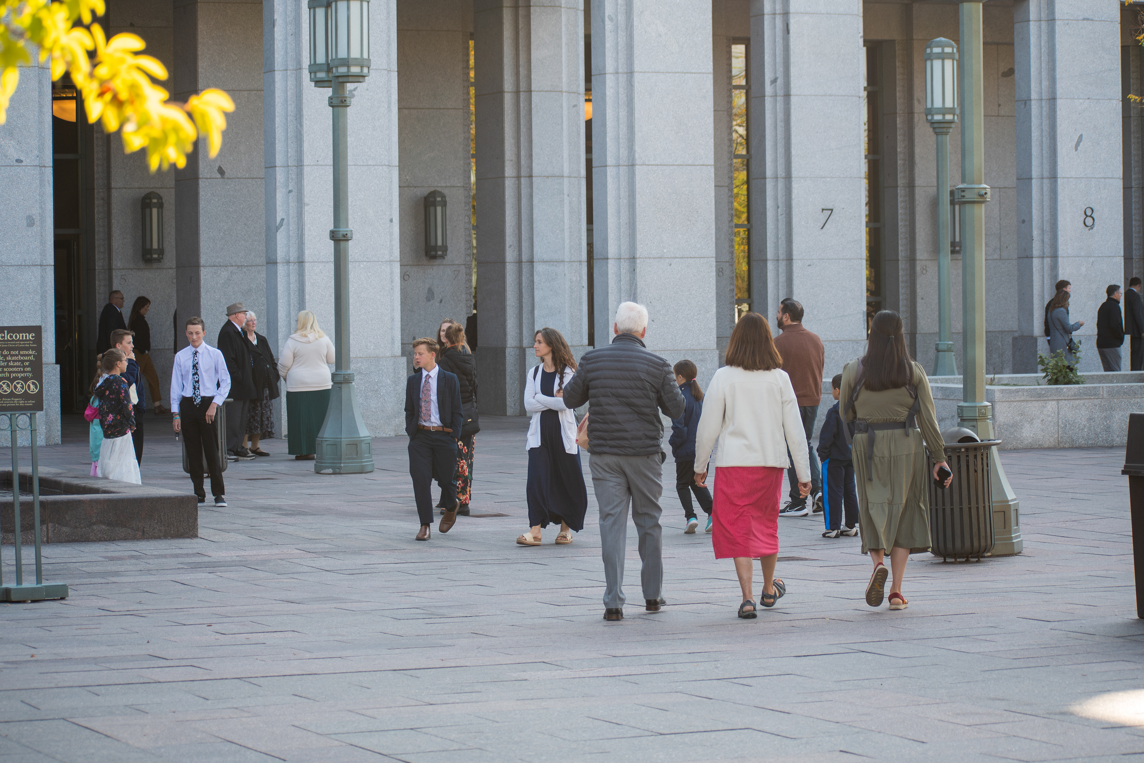 October 6, 2025, Salt Lake City, Utah, USA: People walk through the plaza outside the Conference Center during the public viewing for Russell M. Nelson, the 17th president of the Church of Jesus Christ of Latter-day Saints. Flags fly at half-mast following the death of Nelson at his home in Salt Lake City, Utah, on September 27, 2025, at the age of 101. (Credit Image: © Charles-McClintock Wilson/ZUMA Press Wire)
