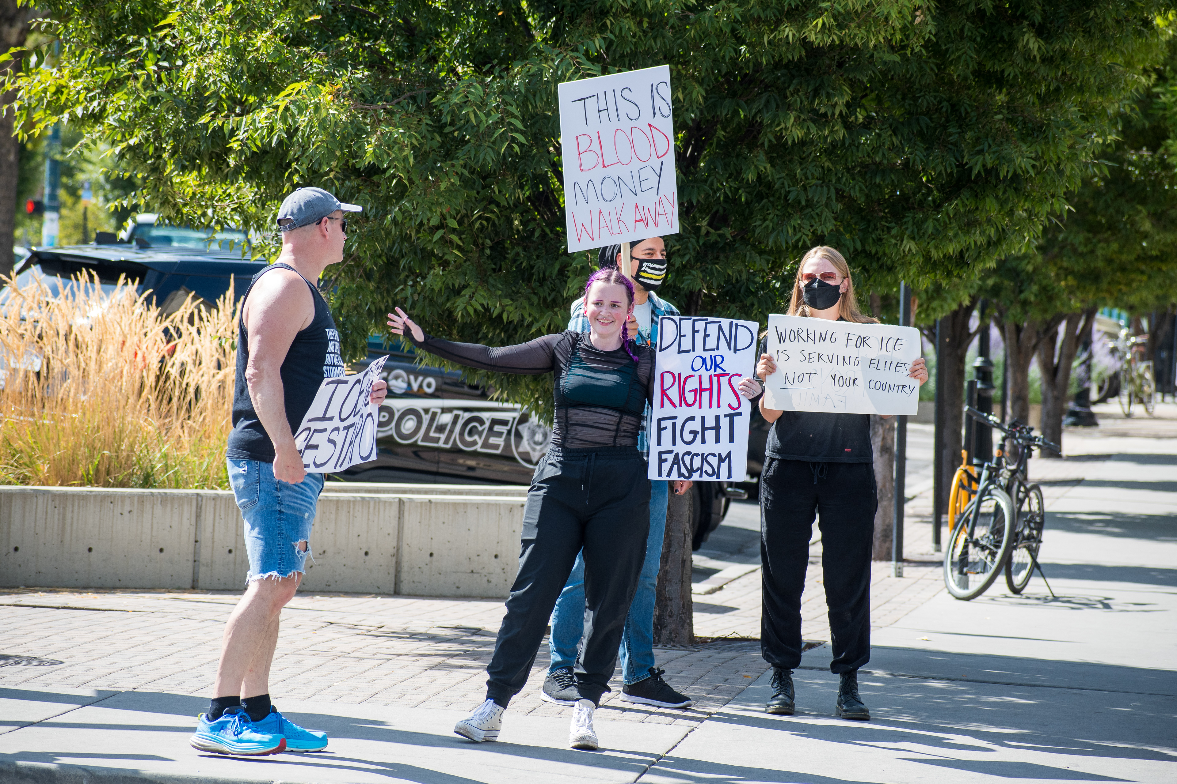 September 15, 2025 – Provo, Utah, United States: Demonstrators hold signs outside the Utah Valley Convention Center during a protest against the Department of Homeland Security career expo, voicing opposition to federal policing and immigration enforcement. Photograph by Charles‑McClintock Wilson / ZUMA Press Wire