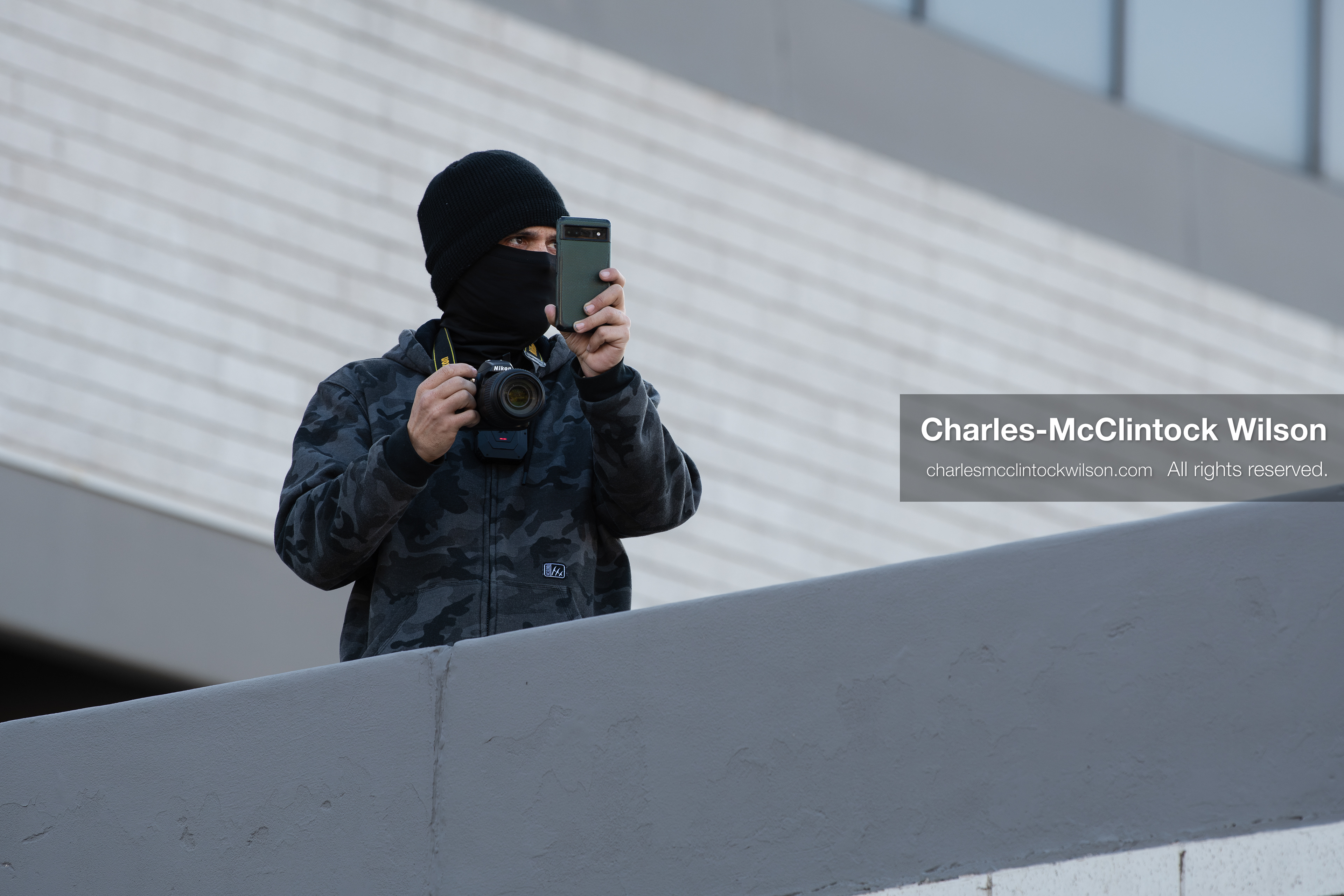 January 30, 2026, Salt Lake City, Utah, USA: A photographer documents the scene during an anti‑ICE protest in Salt Lake City, part of a nationwide response to immigration enforcement policies. (Credit Image: © Charles‑McClintock Wilson/ZUMA Press Wire)