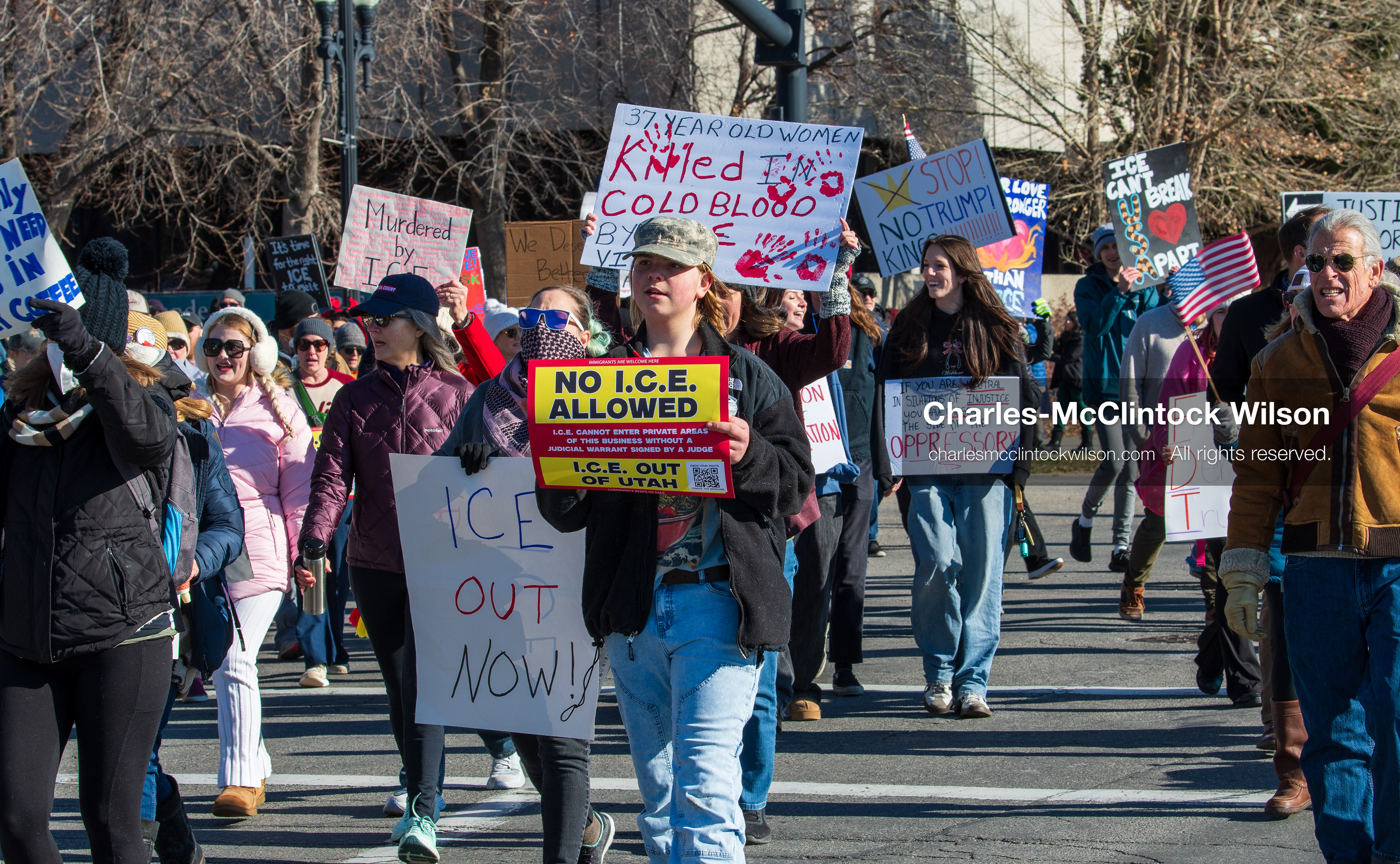 Salt Lake City, Utah, January 10, 2026: A group of demonstrators marches through downtown Salt Lake City during the ICE Out for Good protest, which began at Washington Square Park, with participants carrying signs and personal items as they walk together. (Credit Image: © Charles‑McClintock Wilson/ZUMA Press Wire)