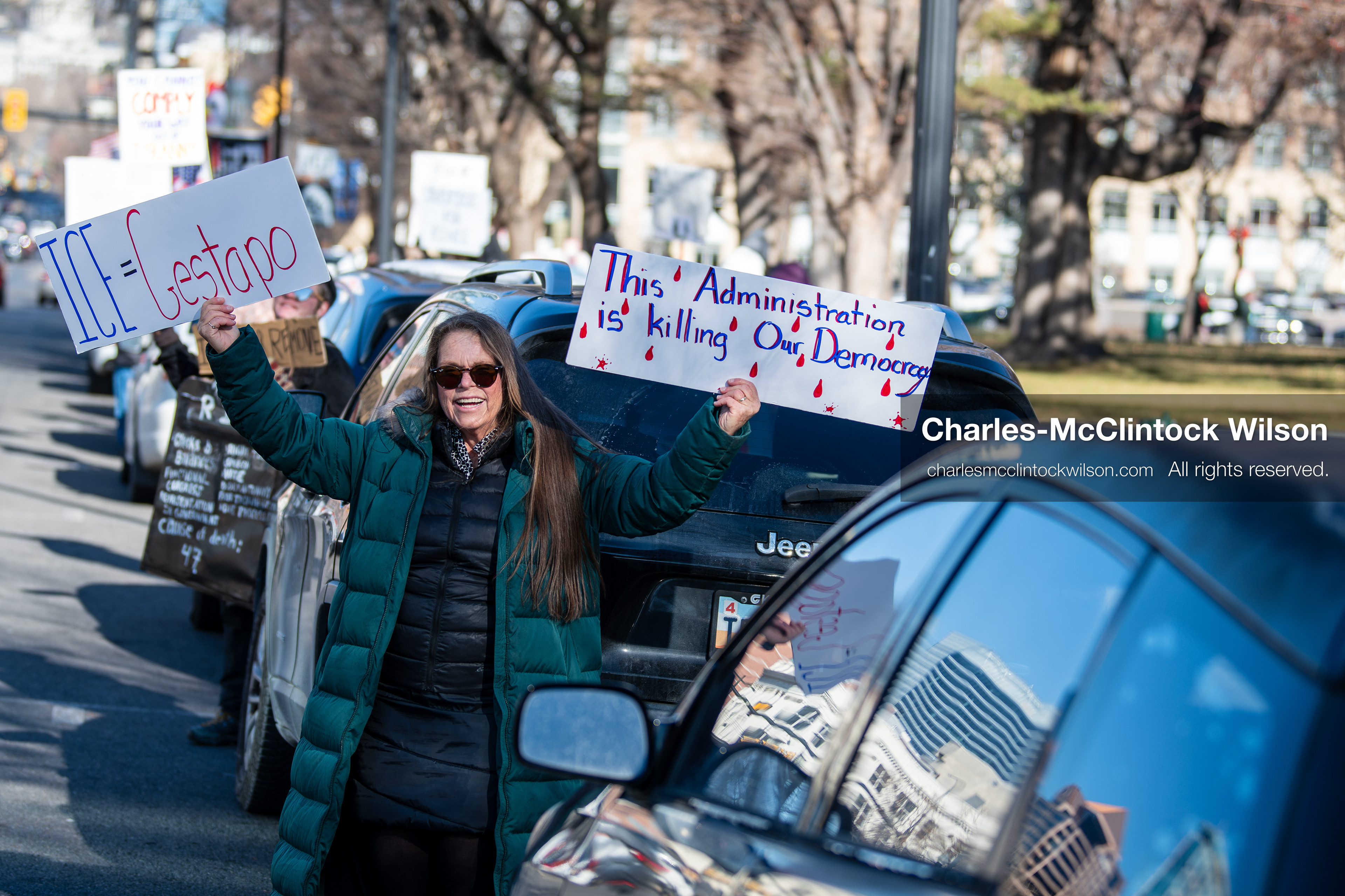 Salt Lake City, Utah, January 10, 2026: Protesters stand with signs at Washington Square Park during the ICE Out for Good protest, a demonstration calling for justice for Renee Nicole Good. (Credit Image: © Charles‑McClintock Wilson/ZUMA Press Wire)