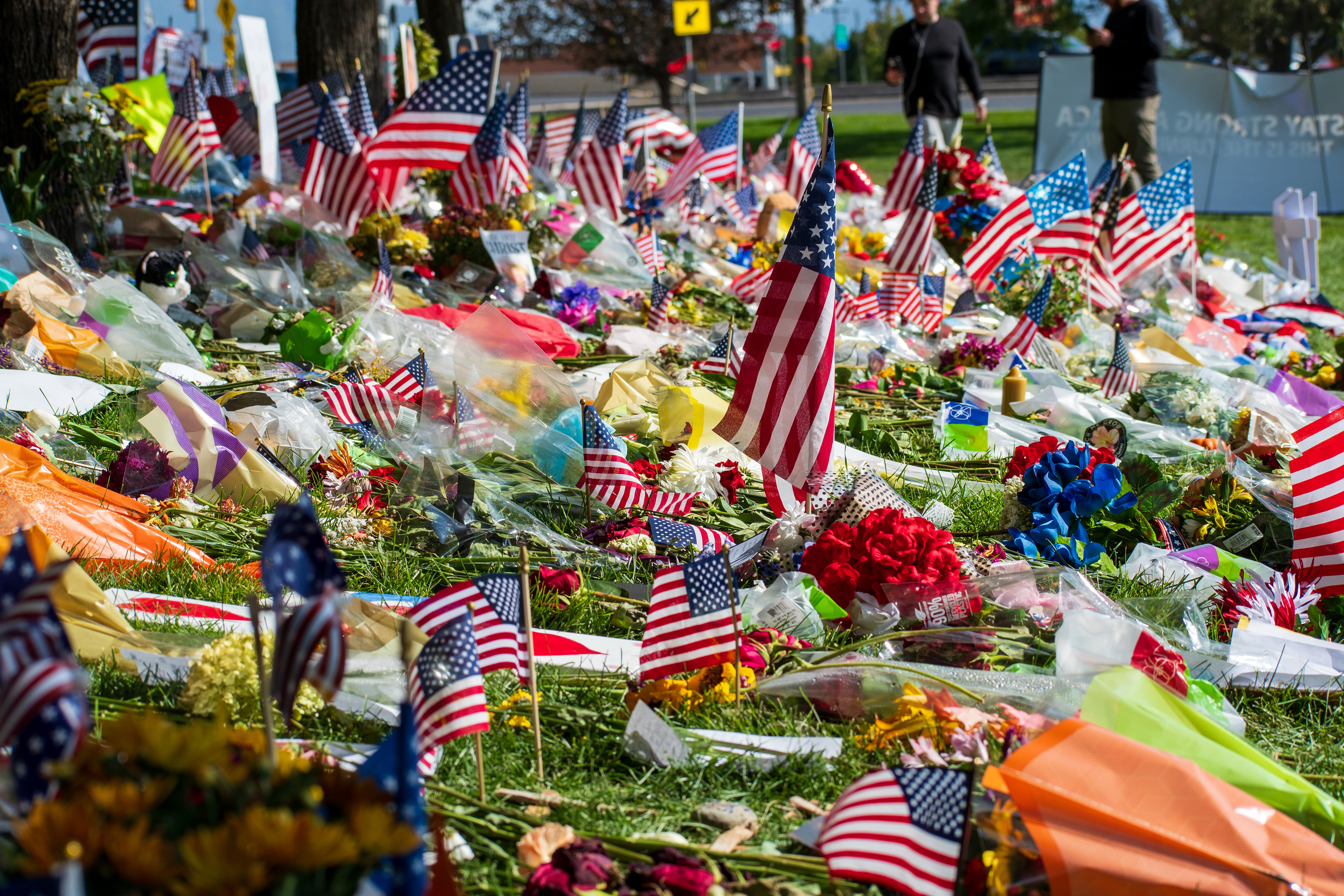 OREM, UTAH – SEPTEMBER 15, 2025: A memorial honoring Charlie Kirk is seen on the campus of Utah Valley University, featuring American flags, candles, flowers, and handwritten signs arranged around a large portrait. The tribute appeared days after Kirk’s final public event at the university. © Charles‑McClintock Wilson / ZUMA Press