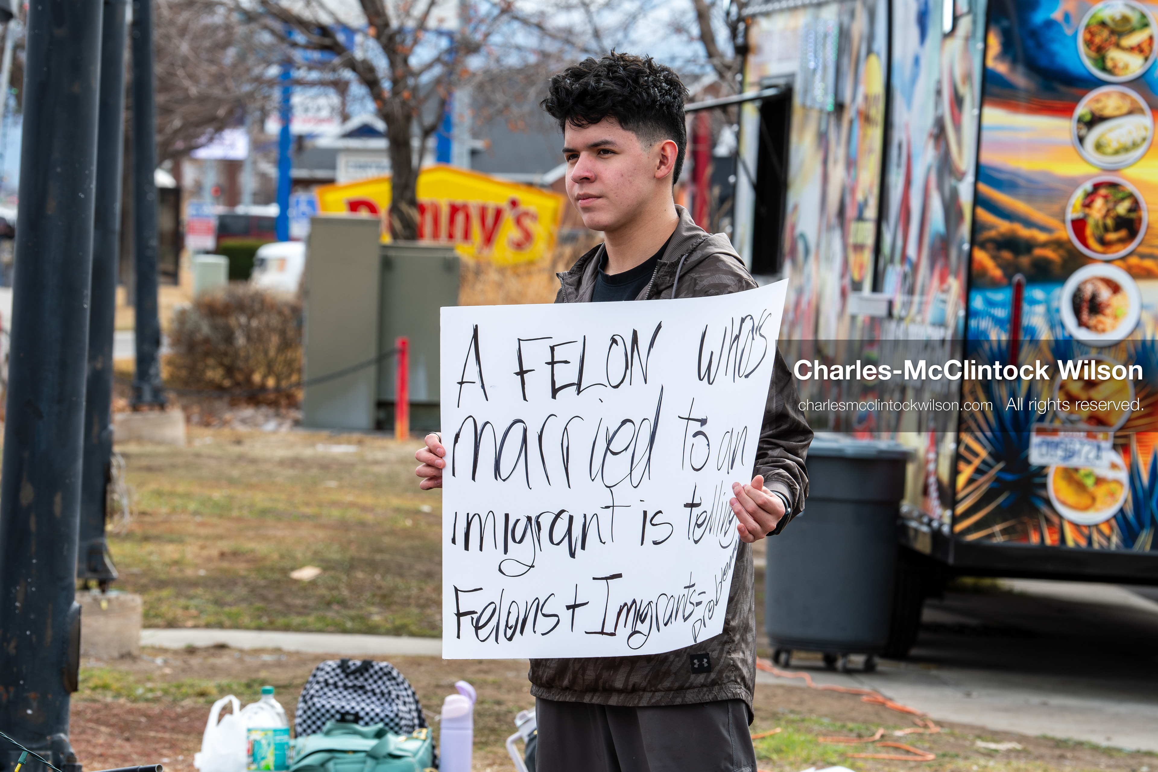 February 11, 2026, Orem, Utah, USA: A student stands along State Street during a student‑led protest involving participants from multiple Orem schools. (Credit Image: © Charles‑McClintock Wilson/ZUMA Press Wire)