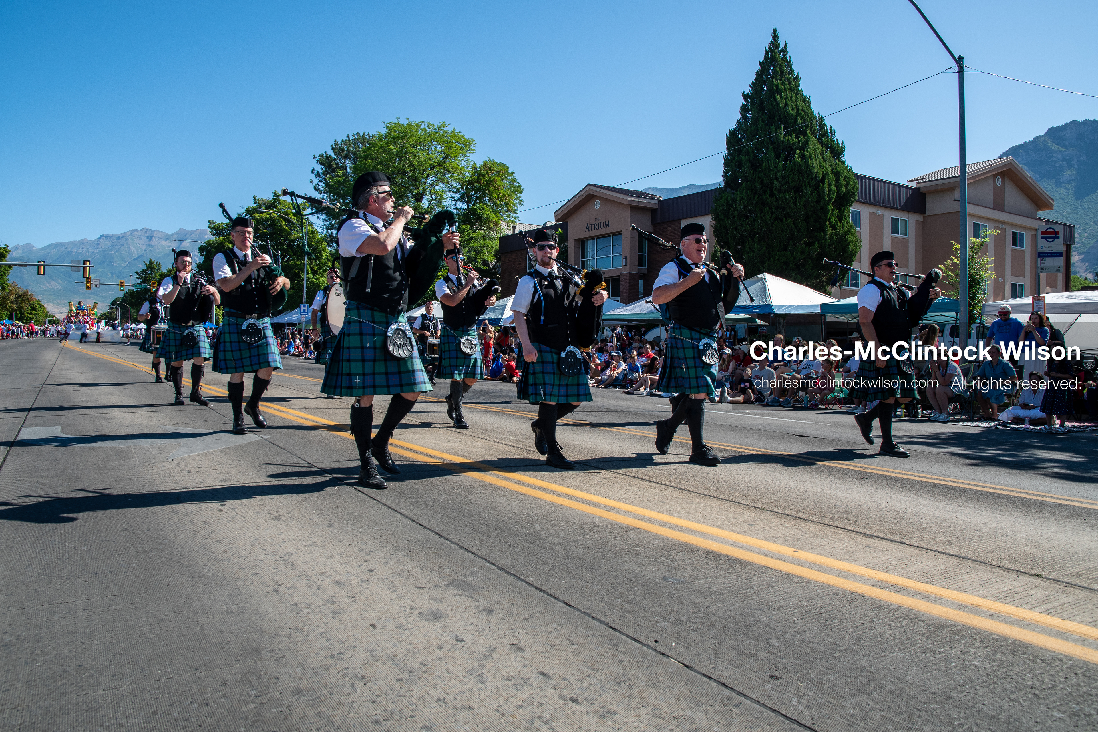 July 4, 2026, Provo, Utah, USA: Members of a pipe and drum band dressed in traditional Scottish kilts march down the street while playing bagpipes during America's Freedom Festival Grand Parade in Provo, Utah, Saturday, July 4, 2026. The annual Independence Day event features expanded programming to honor the 250th anniversary of United States independence. (Credit Image: © Charles-McClintock Wilson/ZUMA Press Wire)
