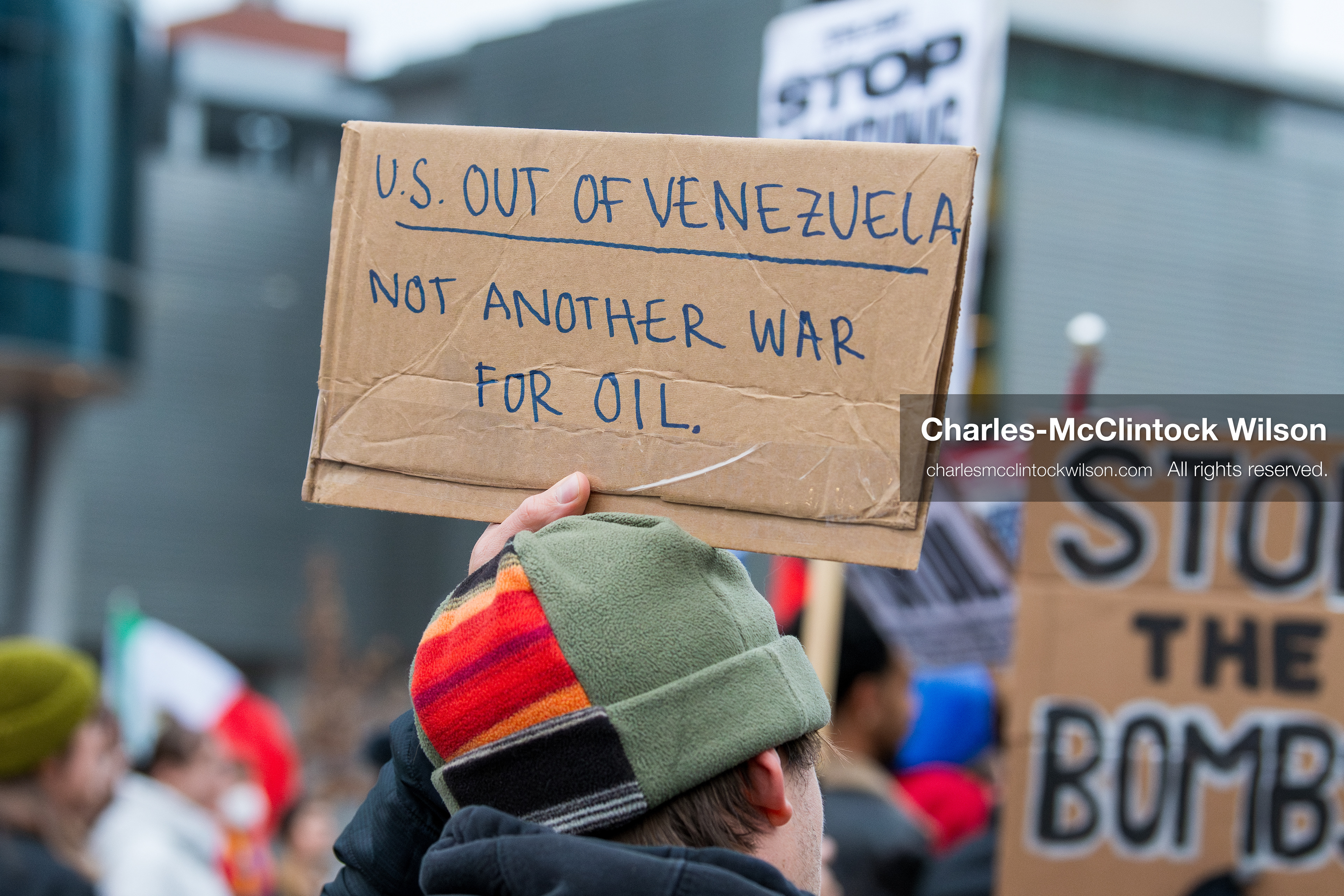 January 3, 2026, Salt Lake City, Utah, USA: A protester holds a sign during a demonstration against US action in Venezuela outside the Wallace Federal Building in Salt Lake City, Utah. The protest was part of a nationwide mobilization responding to recent military developments. (Credit Image: (c) Charles‑McClintock Wilson/ZUMA Press Wire)