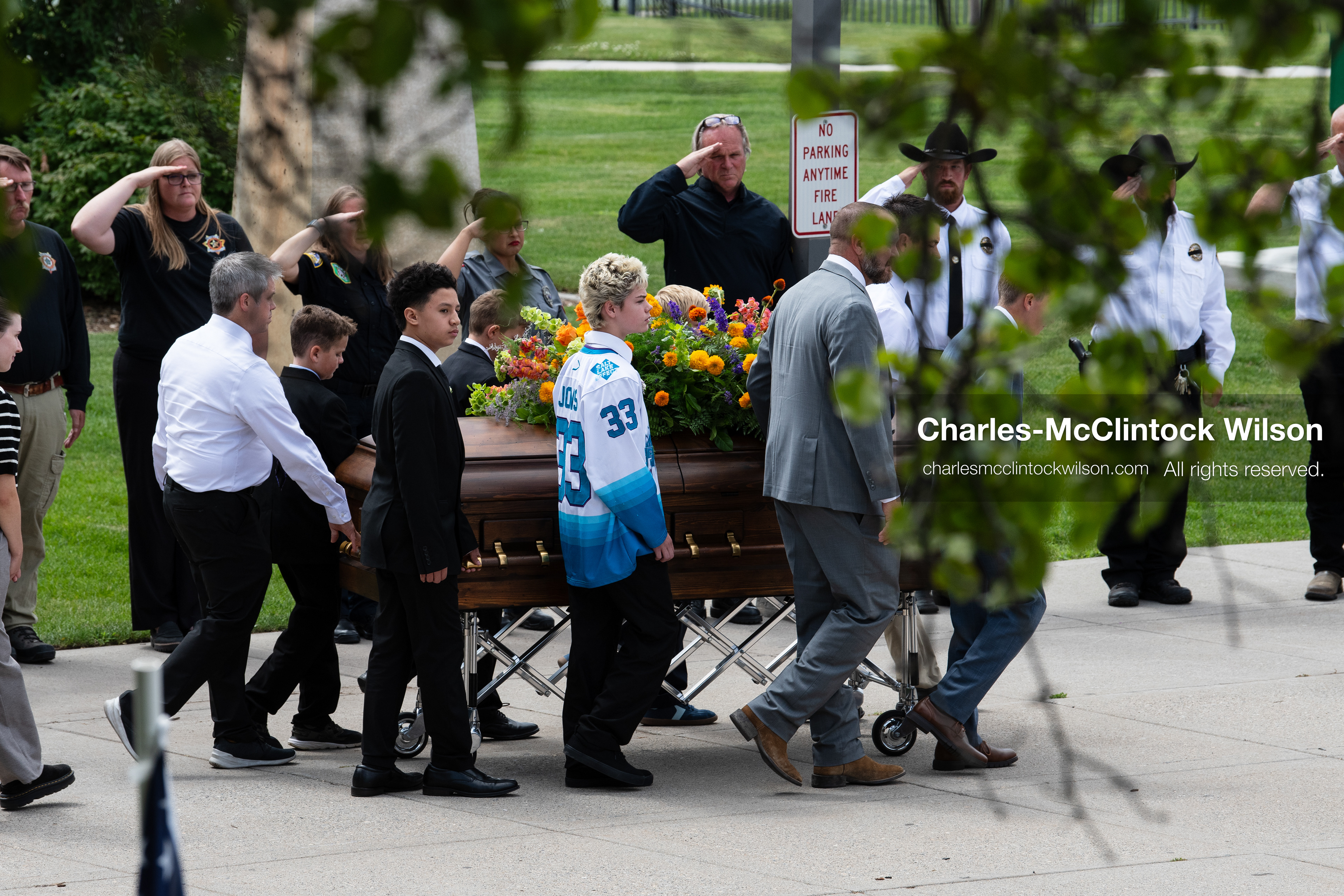 Pallbearers and family members escort the casket of a Long family member outside the UCCU Center at Utah Valley University in Orem, Utah, on Wednesday, July 29, 2026. More than 300 people came to the public memorial ceremony to honor Provo Fire Captain Spencer Long, his wife Katrina, and three of their sons, who died after a flash flood hit their campsite near the Sunglow Campground in Wayne County. (Photo by Charles-McClintock Wilson/Sipa USA)