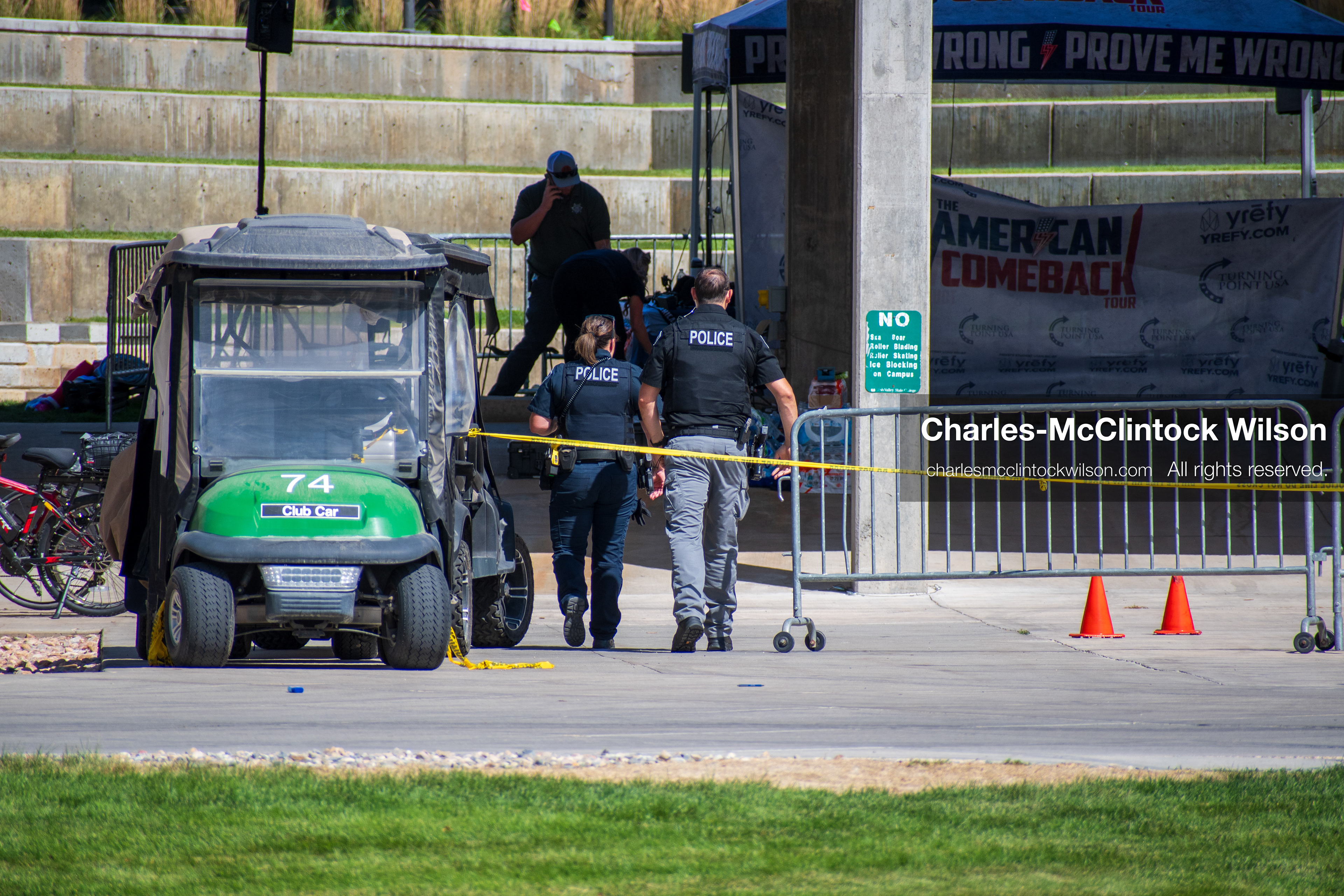 September 12, 2025, Orem, Utah, USA: Investigators and police officers secure the canopy-covered courtyard at Utah Valley University in Orem, Utah, where conservative activist CHARLIE KIRK was fatally shot during a public speaking event on September 10, 2025. KIRK, CEO of Turning Point USA, was seated beneath the canopy when a single bullet struck him in the neck.   (Credit Image: © Charles‑McClintock Wilson/ZUMA Press Wire)