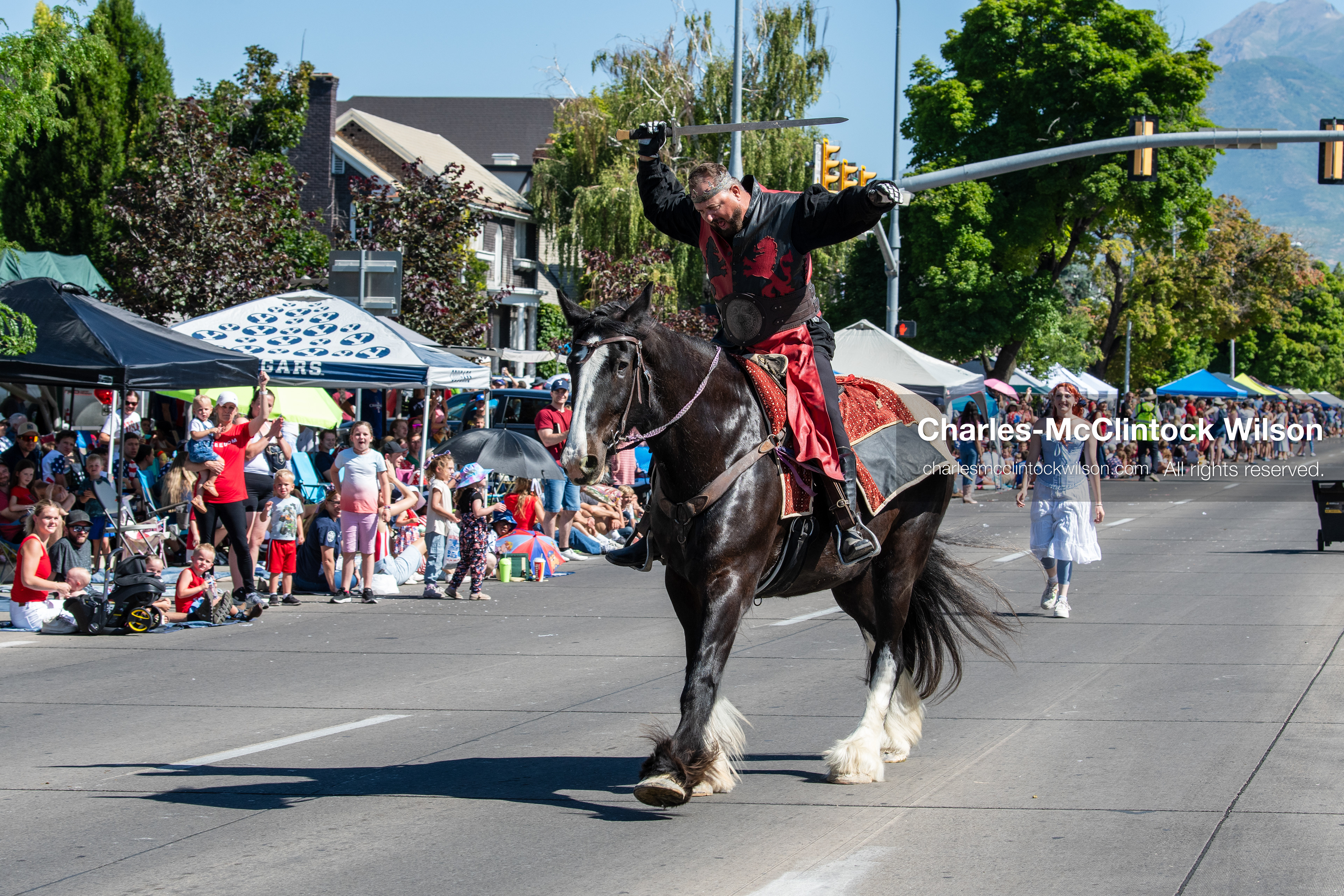 July 4, 2026, Provo, Utah, USA: A horseback rider moves down the center of the pavement during America's Freedom Festival Grand Parade in Provo, Utah, Saturday, July 4, 2026. The annual event drew thousands of spectators to the downtown corridor. (Credit Image: © Charles-McClintock Wilson/ZUMA Press Wire)