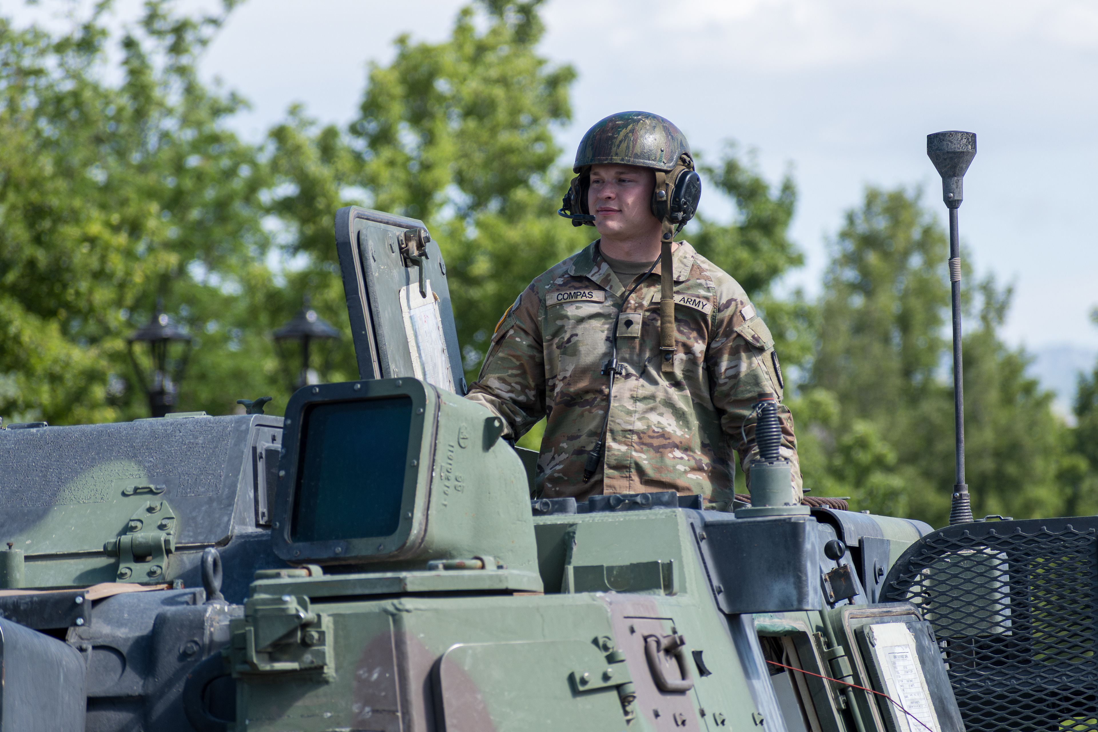 Provo, Utah – July 4, 2025: U.S. Army personnel ride atop a military vehicle during the Freedom Festival Grand Parade, honoring service and adding a patriotic presence to the Independence Day.
