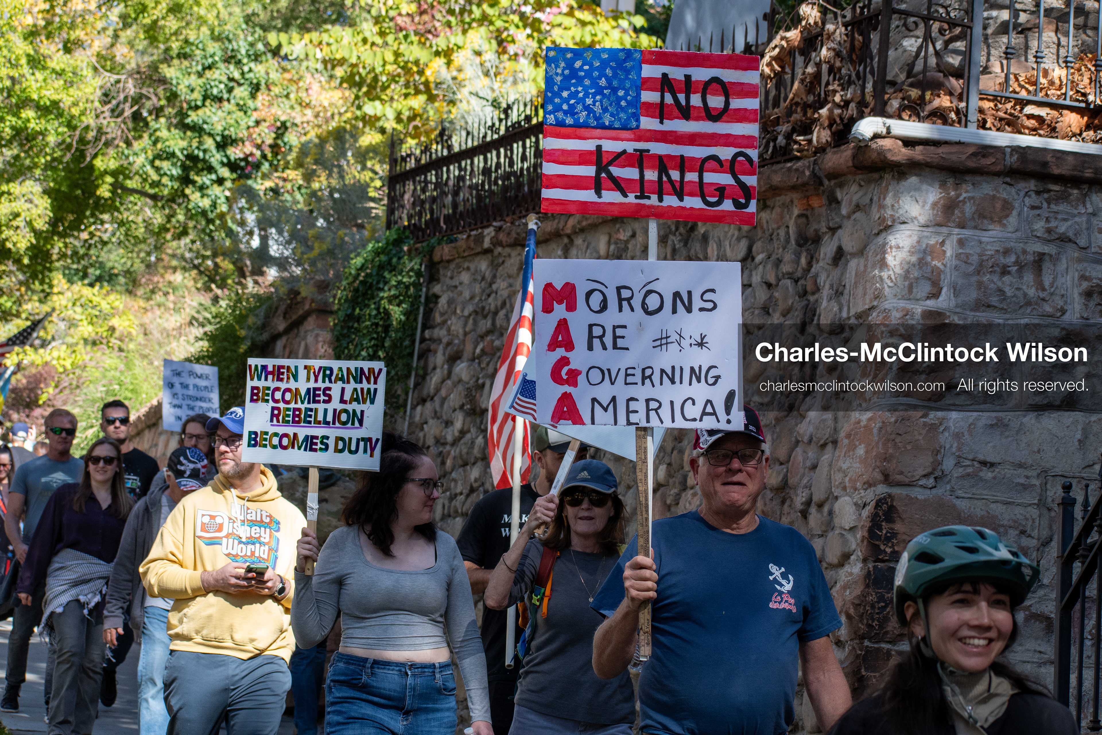 October 18, 2025, Salt Lake City, Utah, USA: Demonstrators march along South State Street during a "No Kings" protest in Salt Lake City, Utah. The protest was part of a nationwide mobilization.